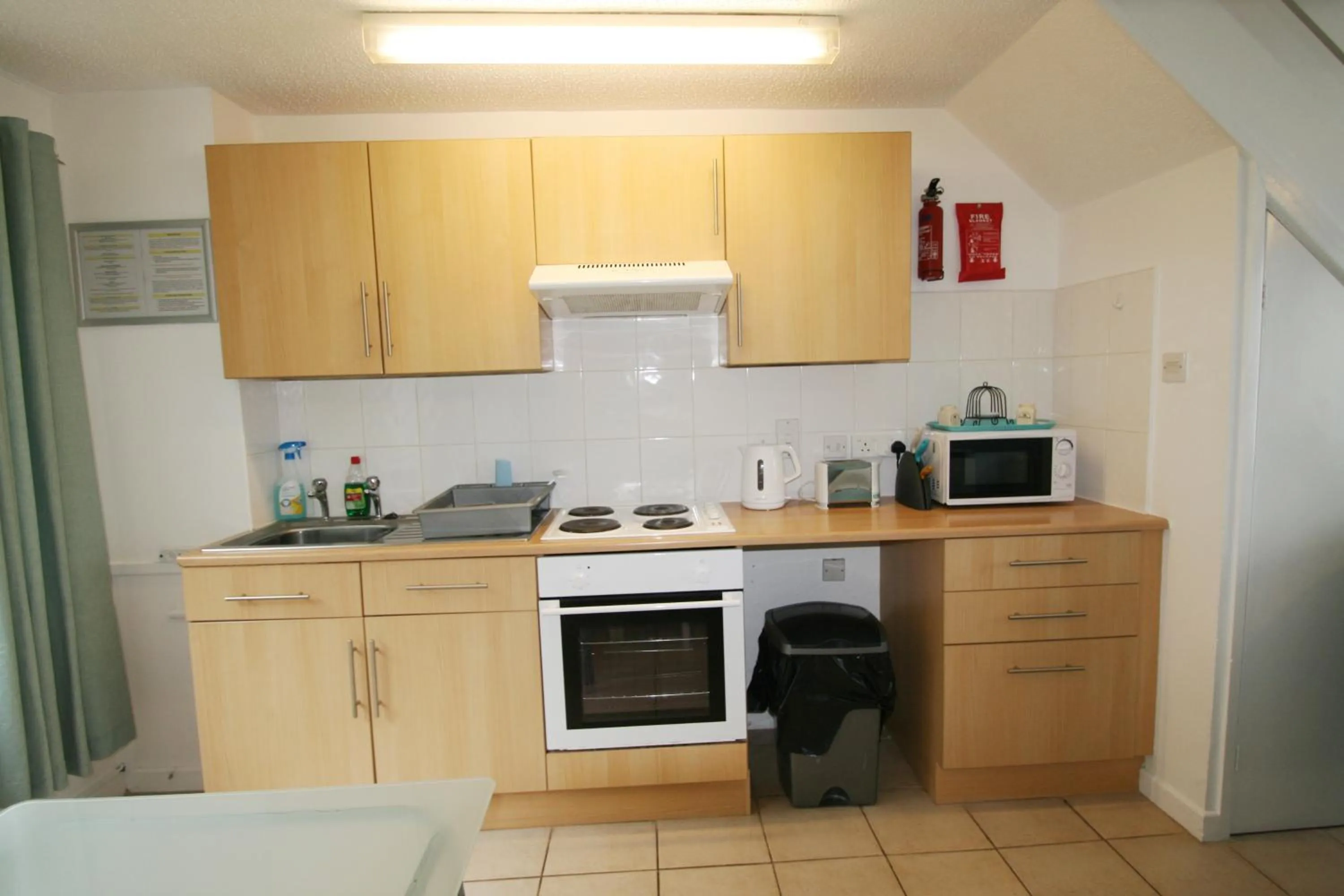 Kitchen or kitchenette in Freshwater Bay Holiday Cottages
