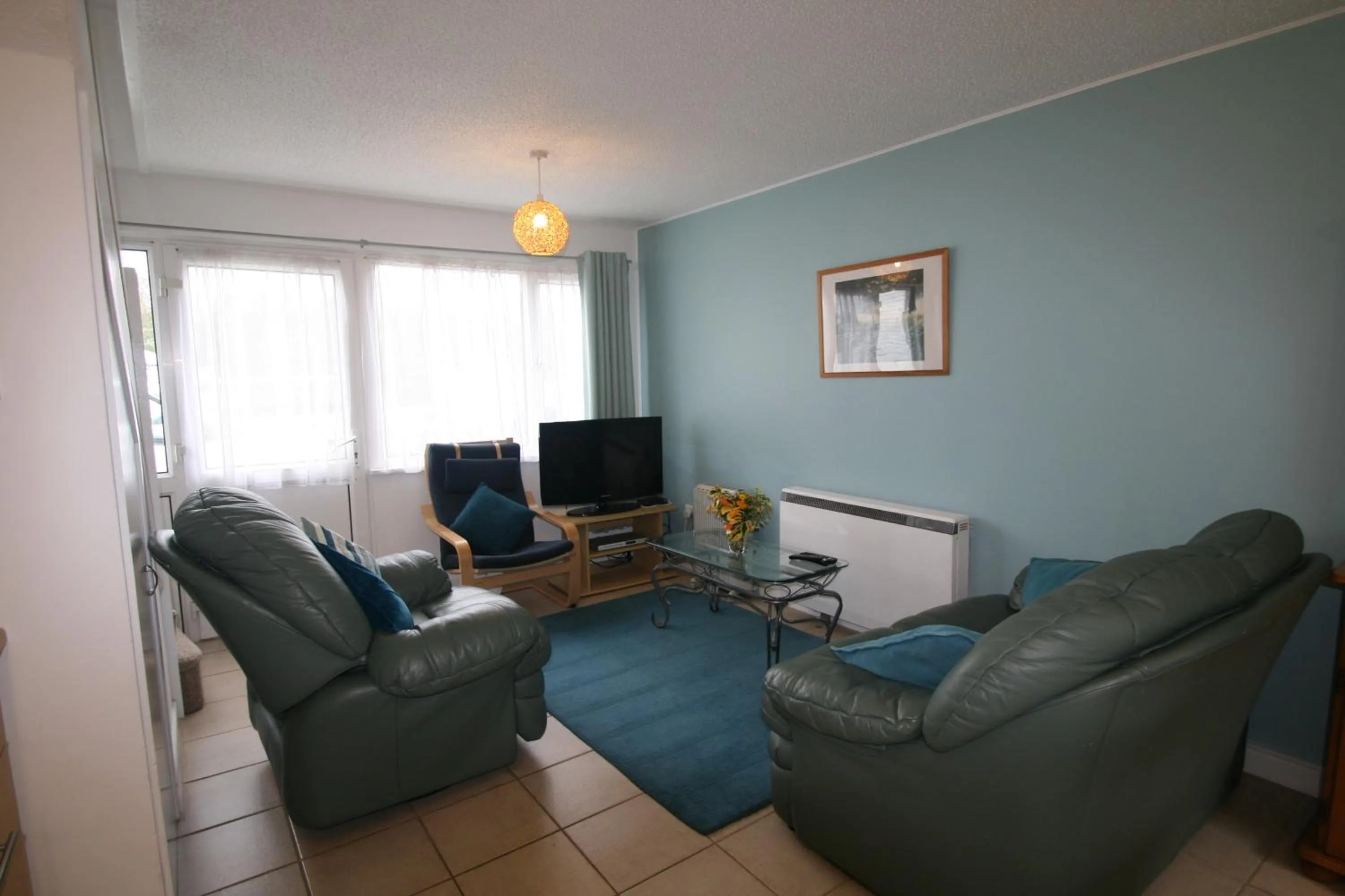 Living room in Freshwater Bay Holiday Cottages
