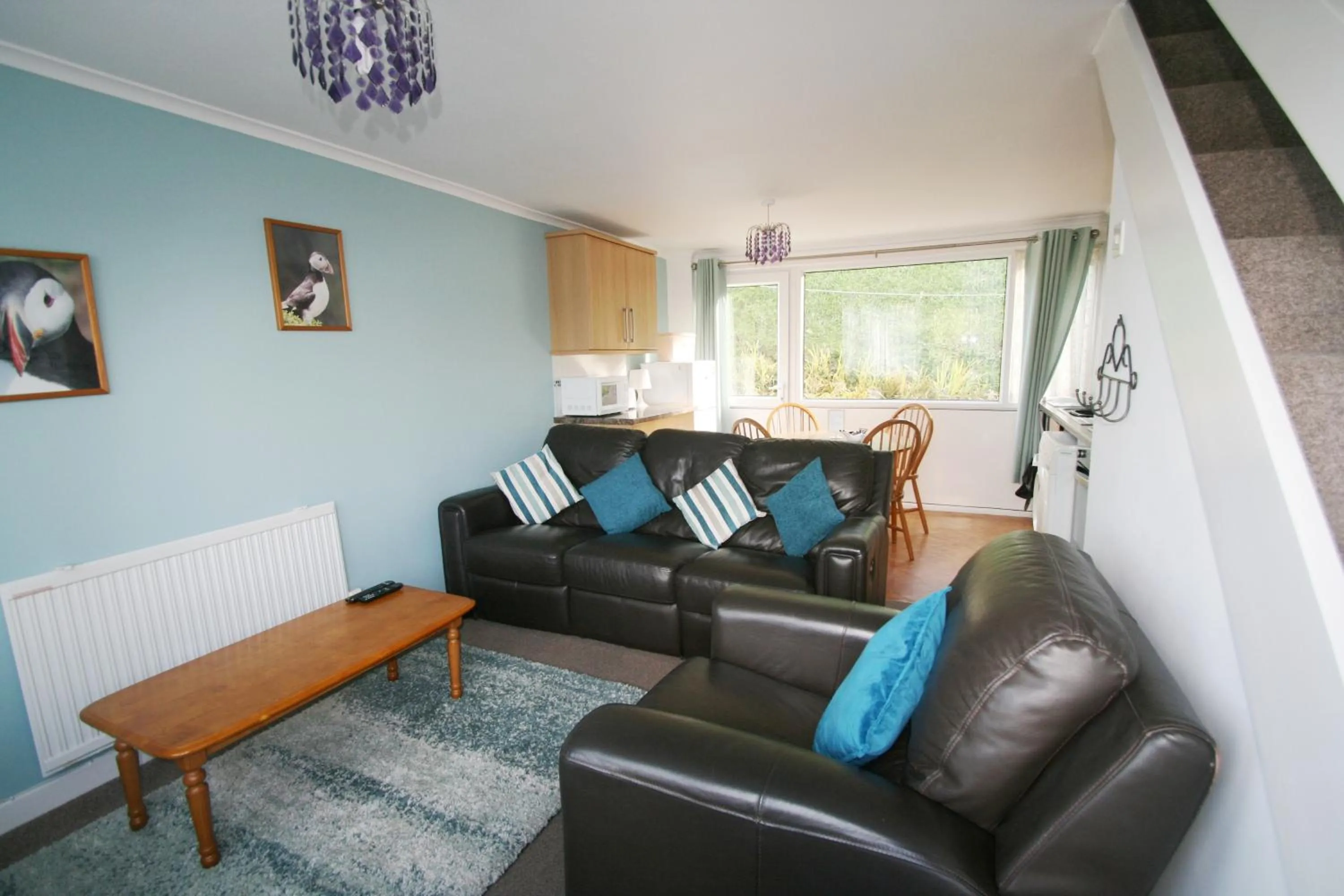 Living room in Freshwater Bay Holiday Cottages
