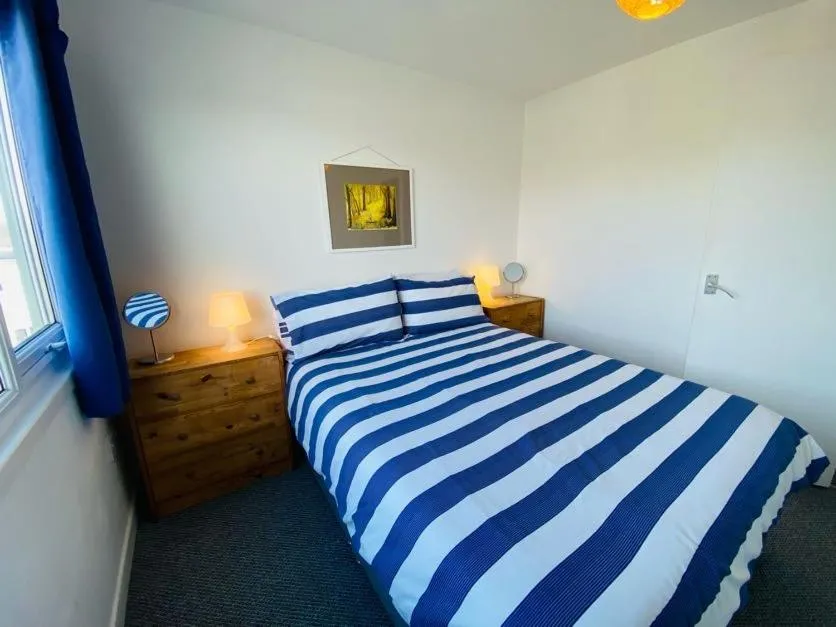 Bed in Freshwater Bay Holiday Cottages