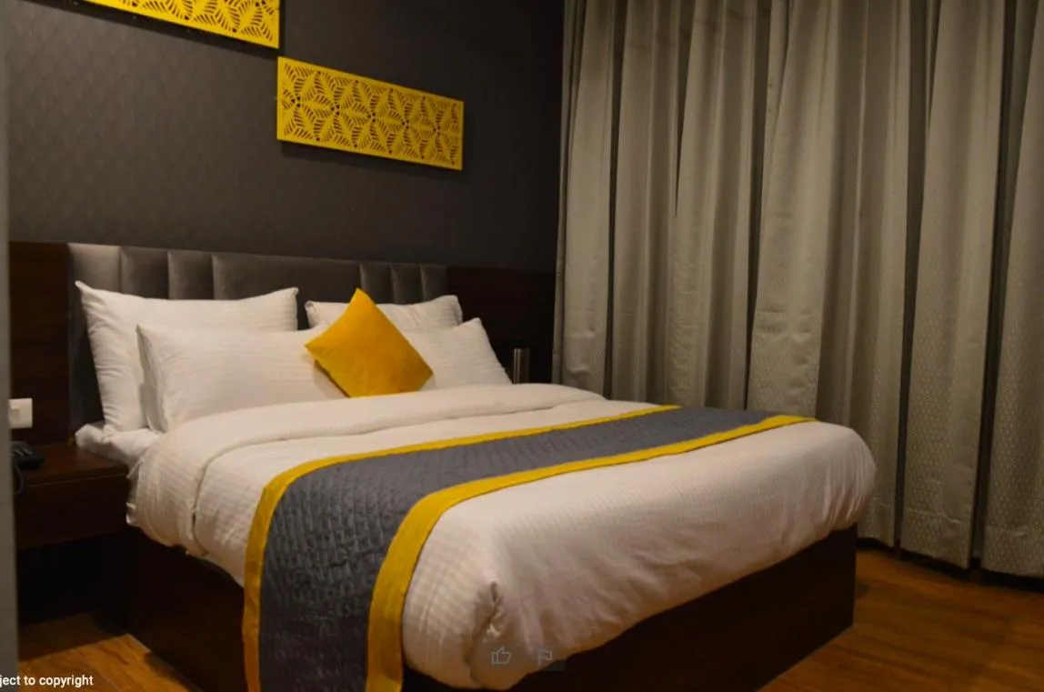 Bed in Ka10 SQUARE HOTEL & BANQUETS