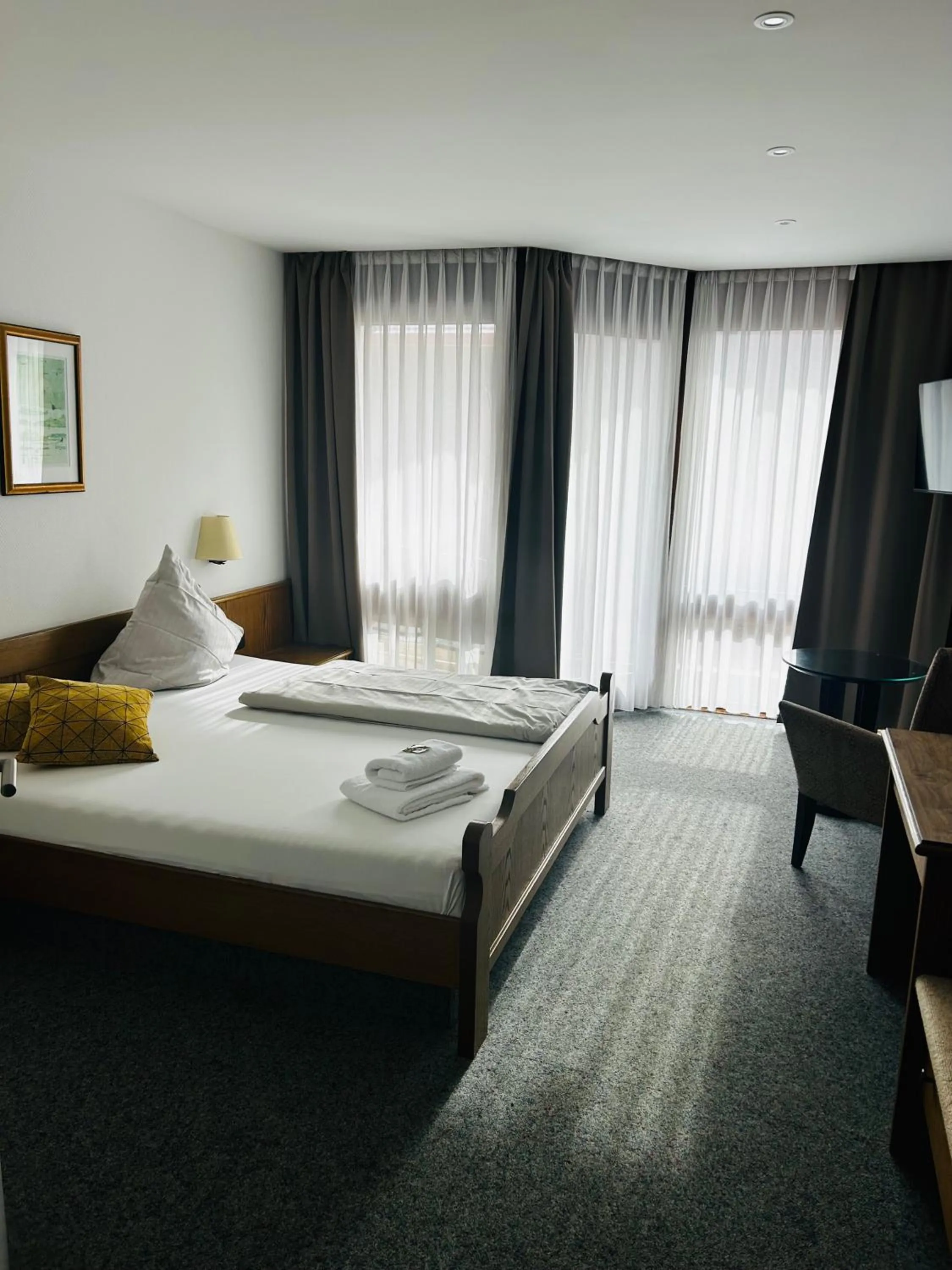 Photo of the whole room, Bed in Landhotel Sonnenbühl