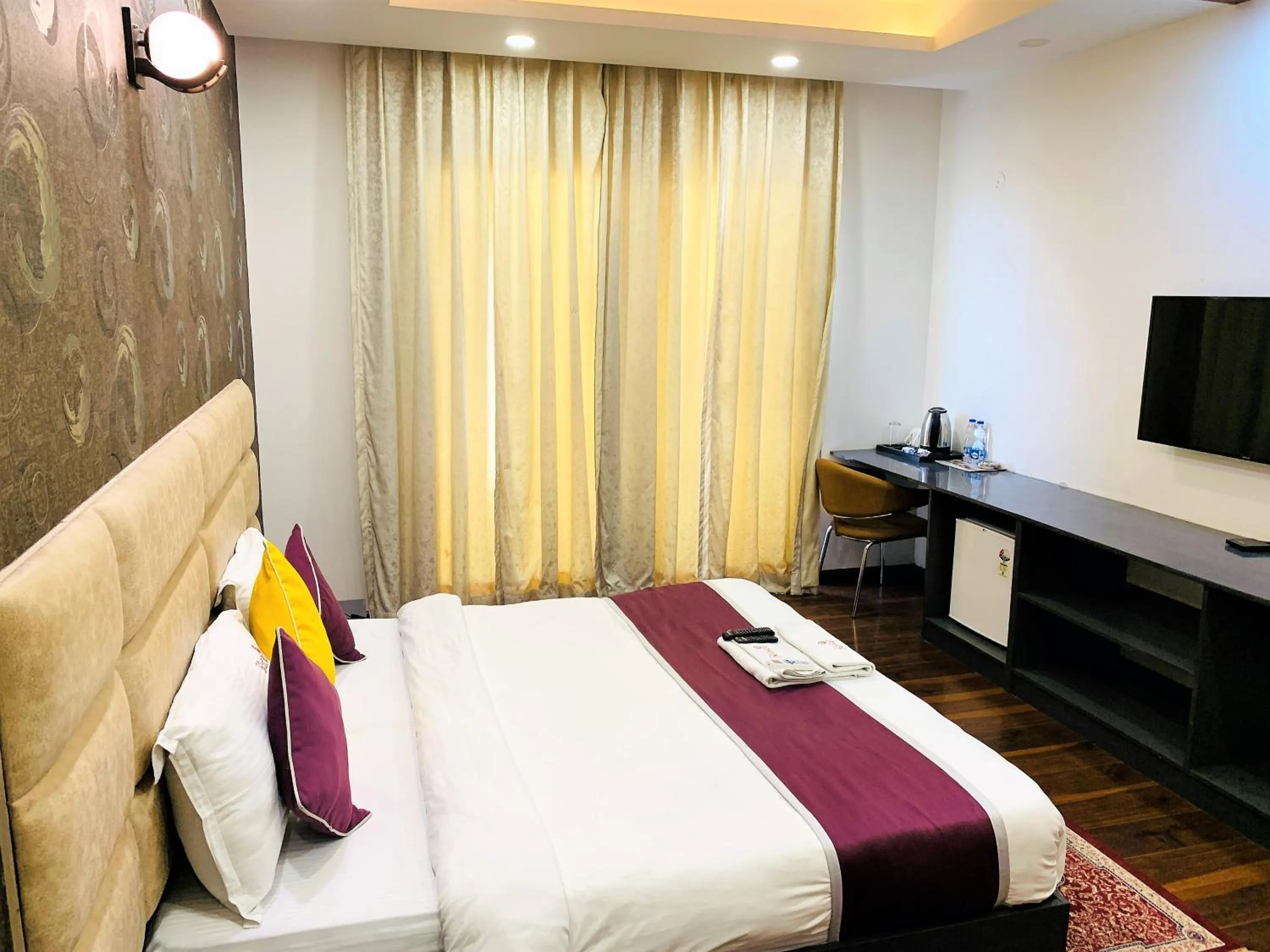 TV and multimedia, Bed in Lime Tree Hotel Pulkit Gurgaon-Artemis Hospital, Nearest Metro Huda City Centre