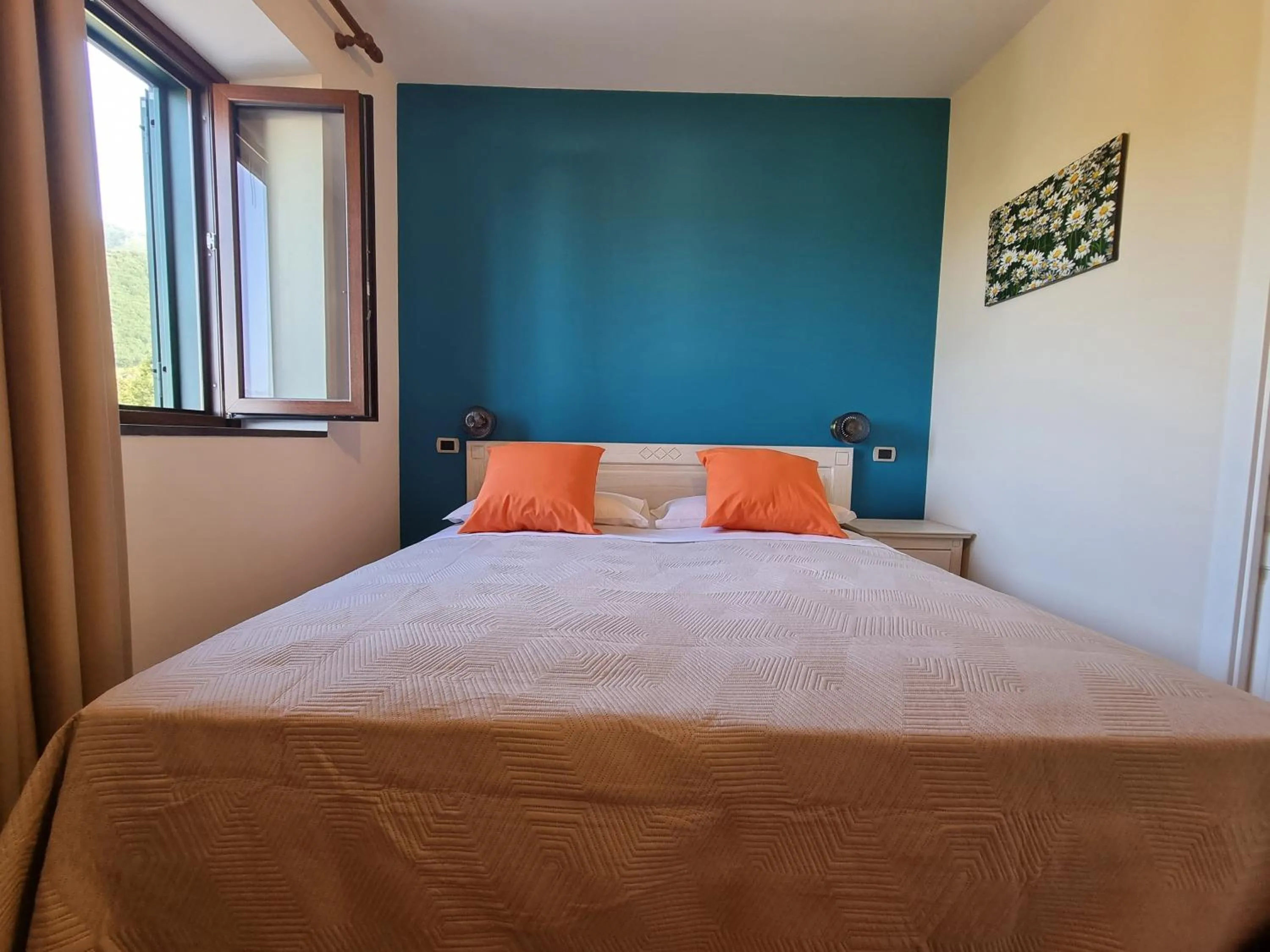 Bed in Casa Fifina Rooms