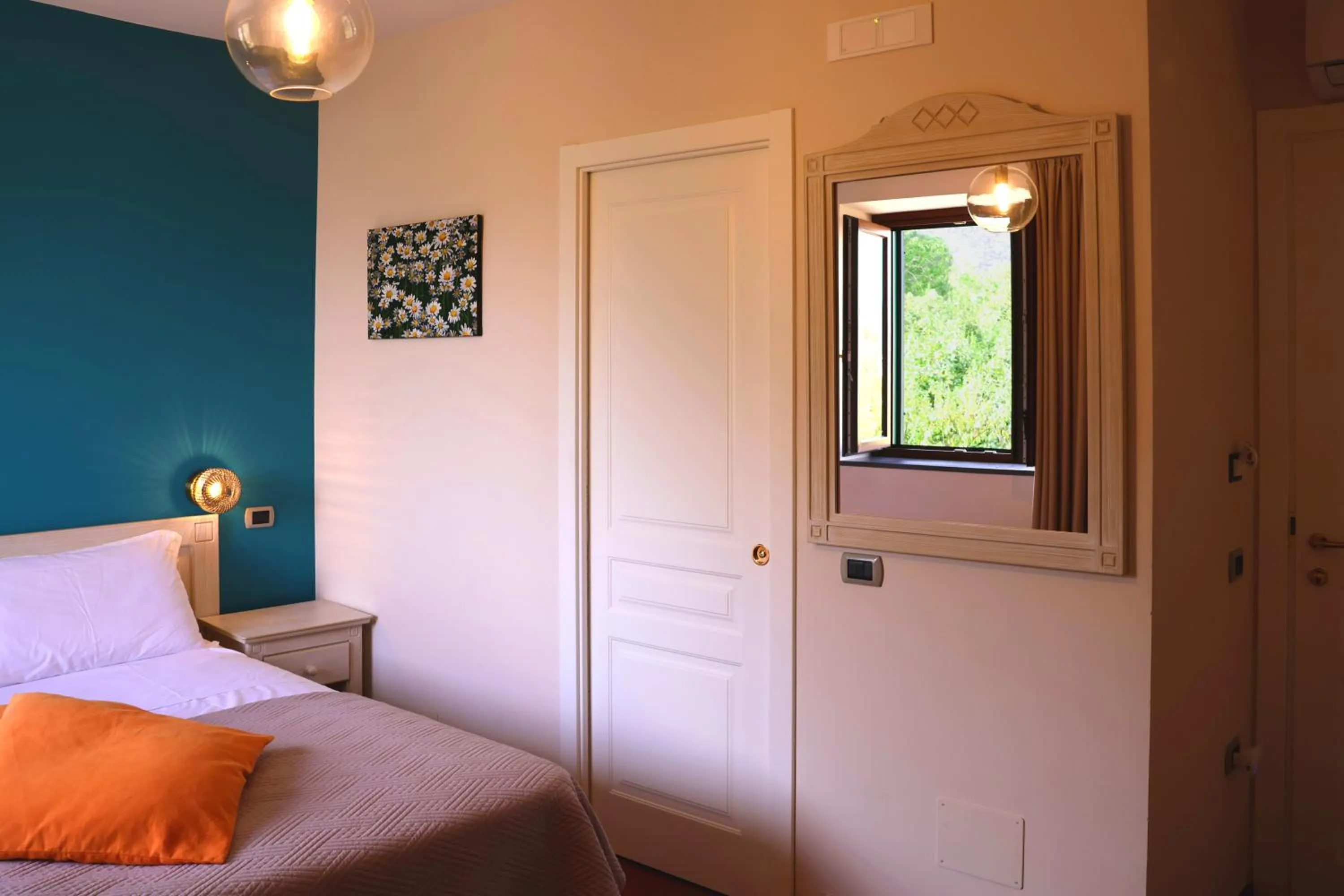 Bed in Casa Fifina Rooms