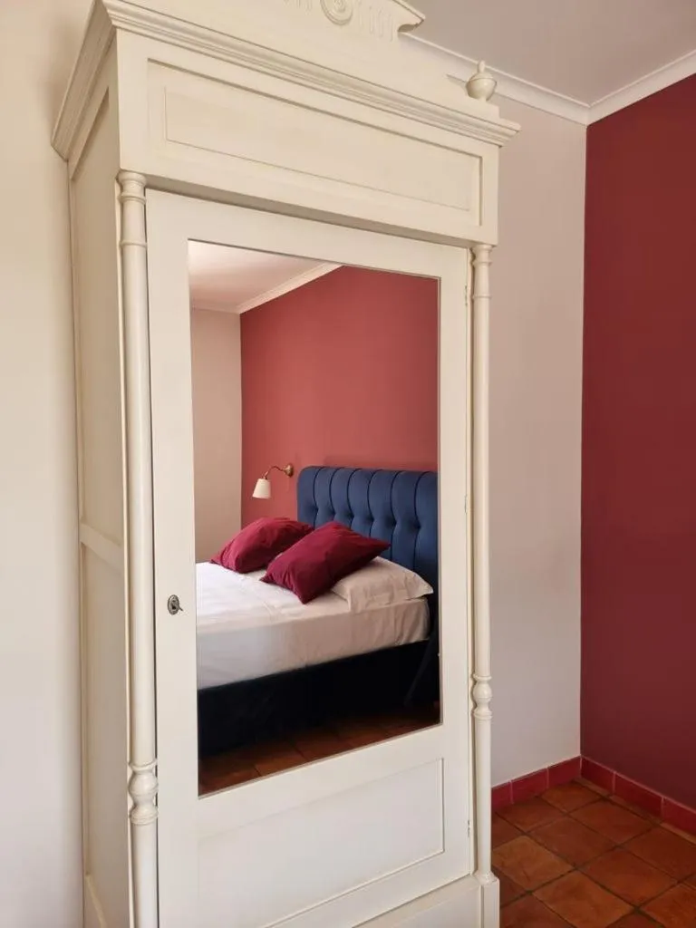 Bed in Casa Fifina Rooms