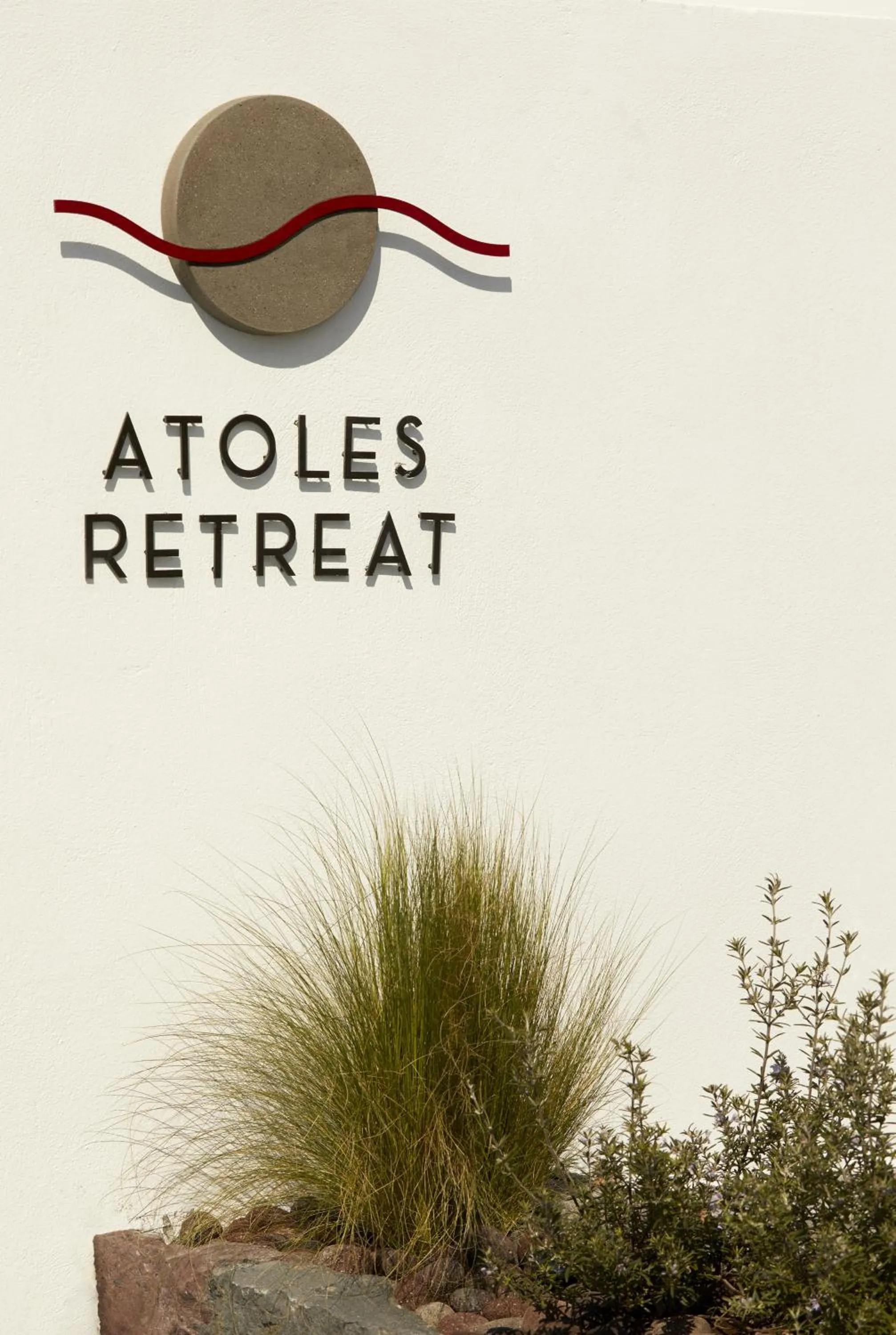 Property logo or sign in Atoles Retreat