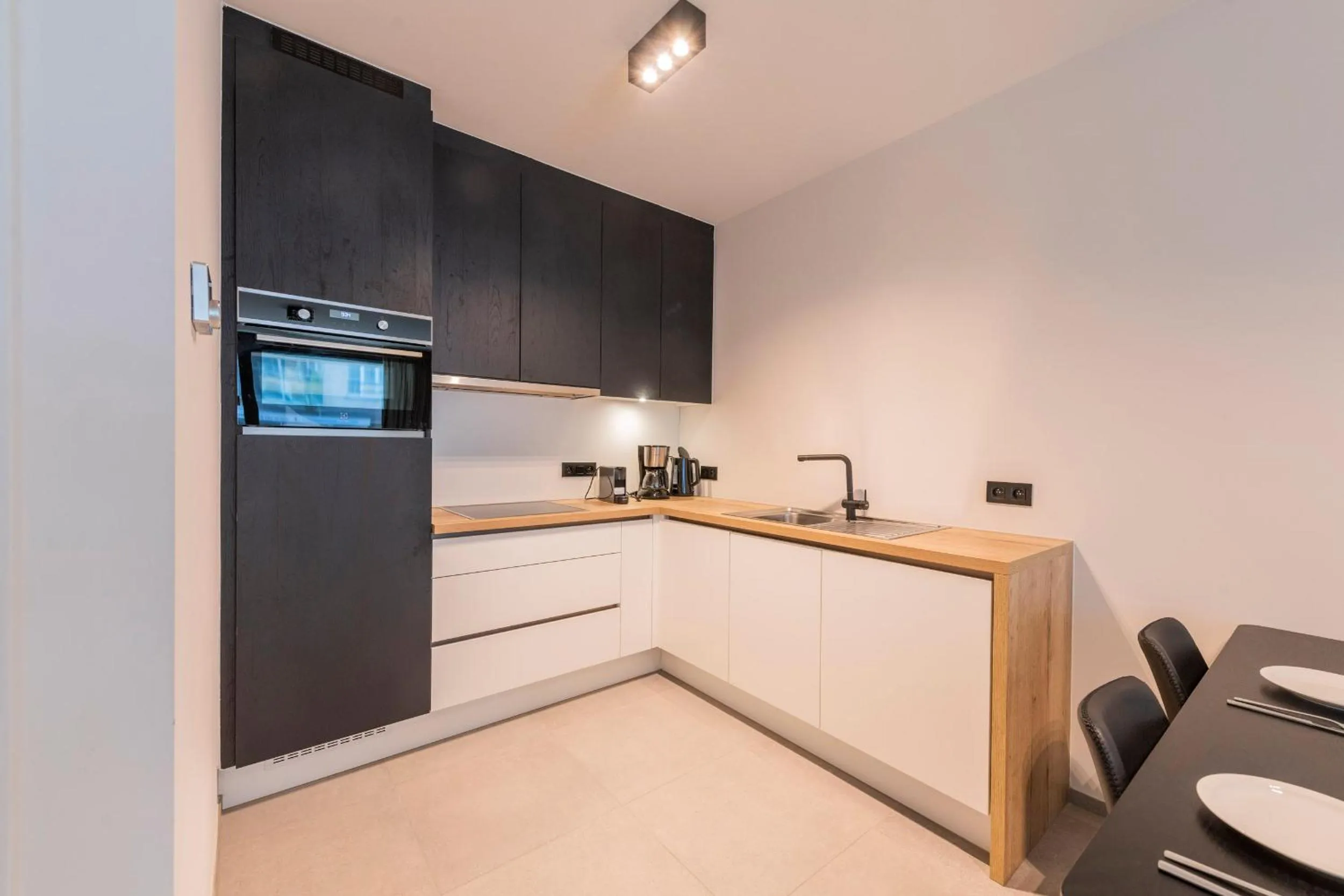 kitchen in Belcasa Beach Suites & Lofts Aparthotel