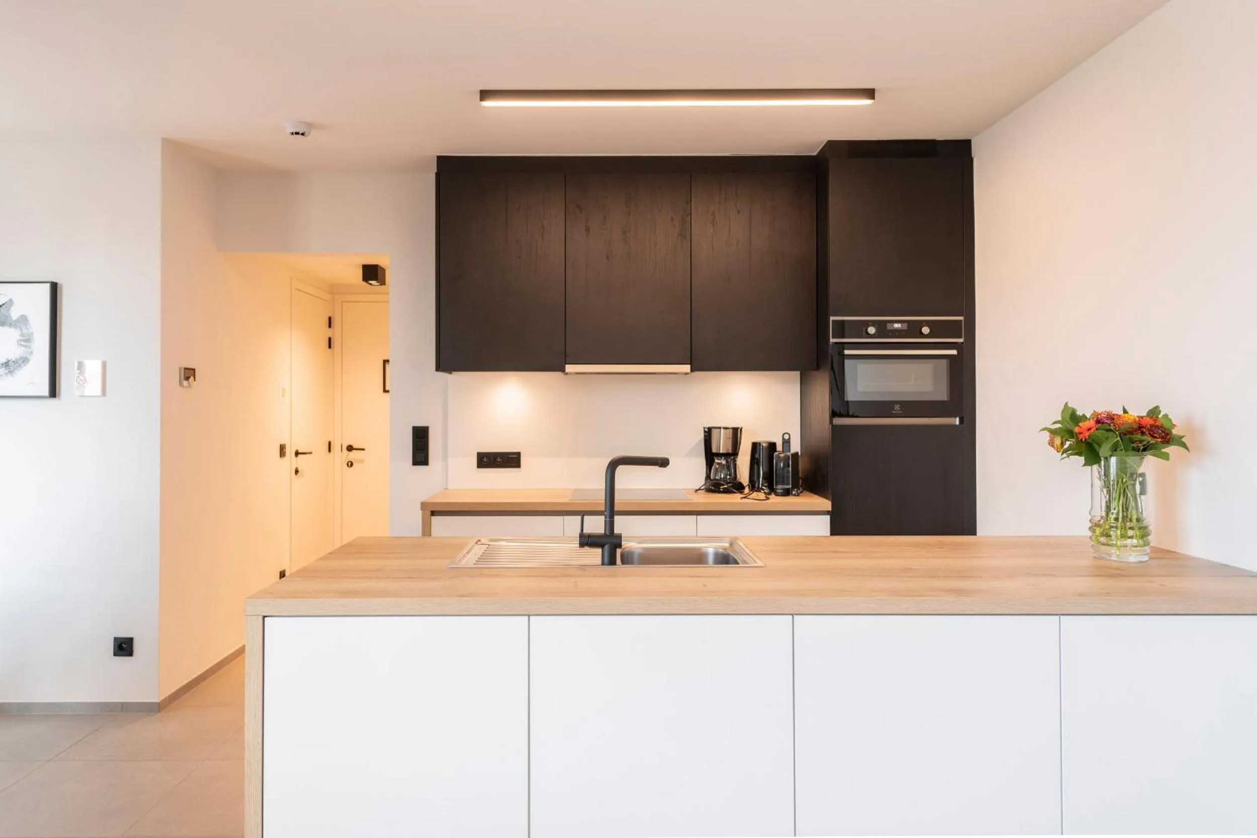 kitchen in Belcasa Beach Suites & Lofts Aparthotel