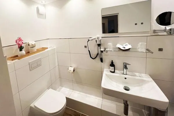Bathroom in Ihr Ferien Hotel Brunnenhof