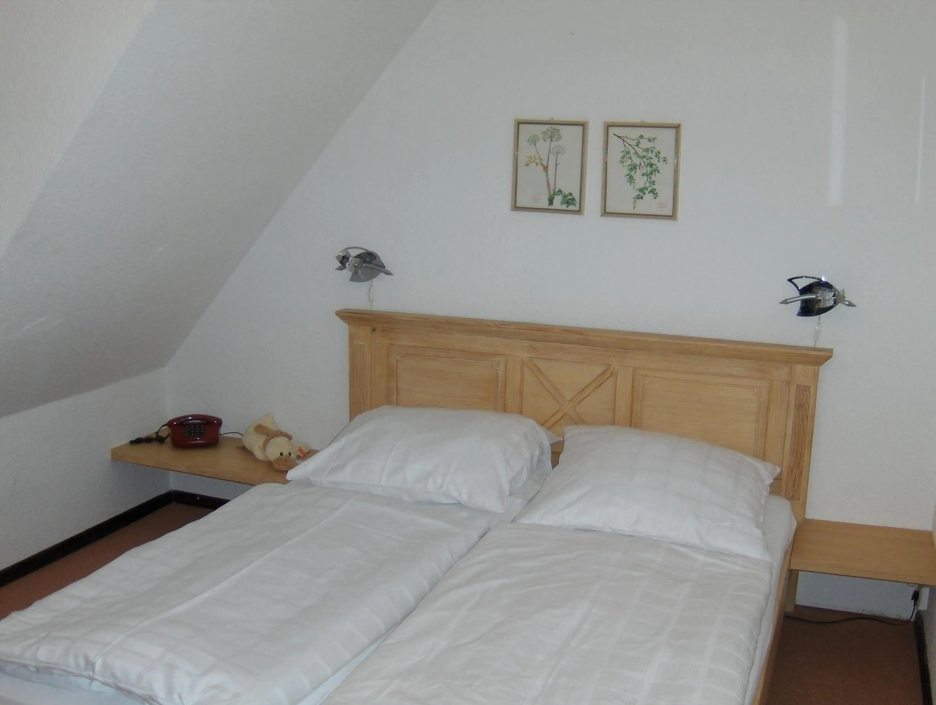 Photo of the whole room, Bed in Ihr Ferien Hotel Brunnenhof