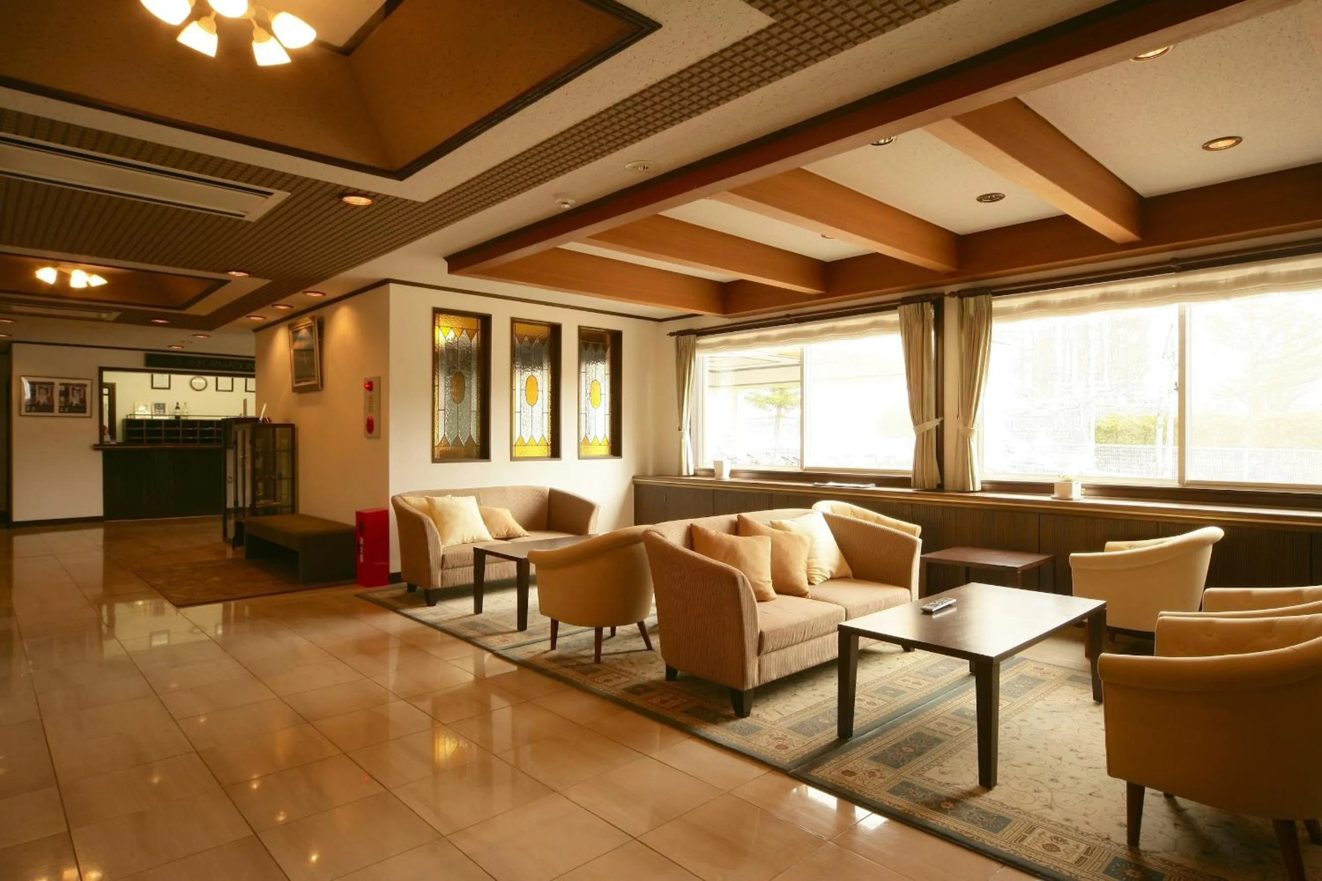 Communal lounge/ TV room in Hotel Petit Riviere Karuizawa