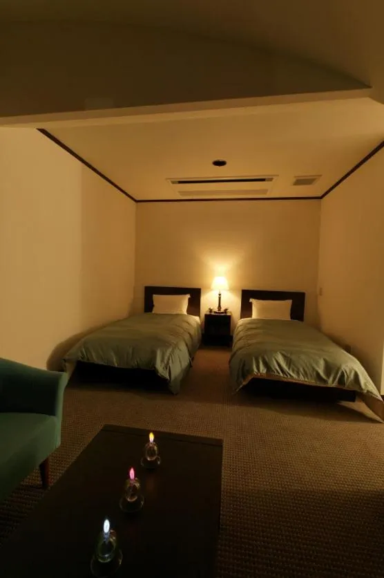 Bed in Hotel Petit Riviere Karuizawa