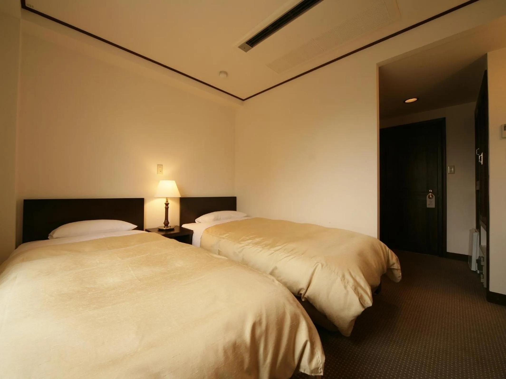 Photo of the whole room, Bed in Hotel Petit Riviere Karuizawa