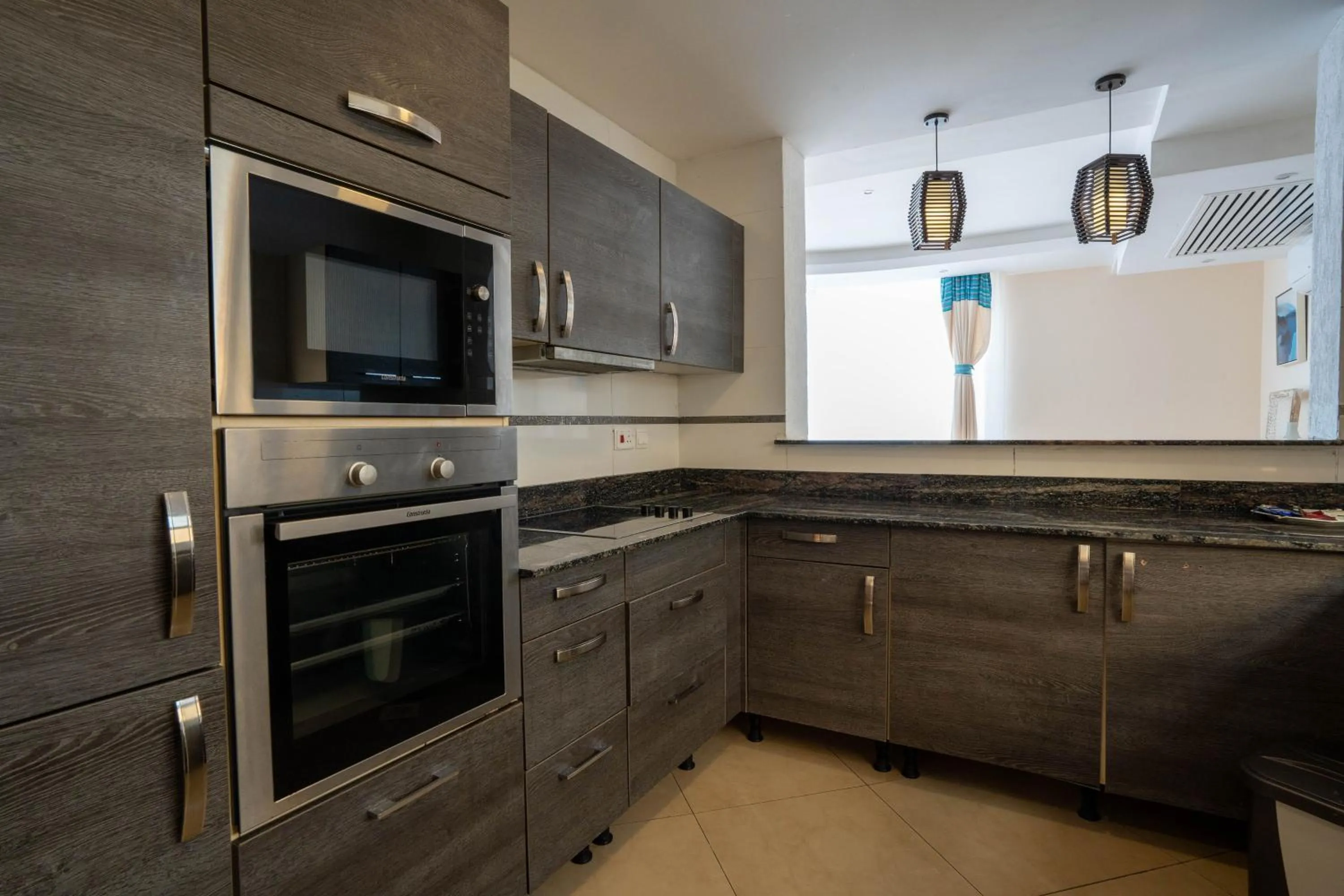 Kitchen or kitchenette in Kilua Residences by CityBlue, Mombasa