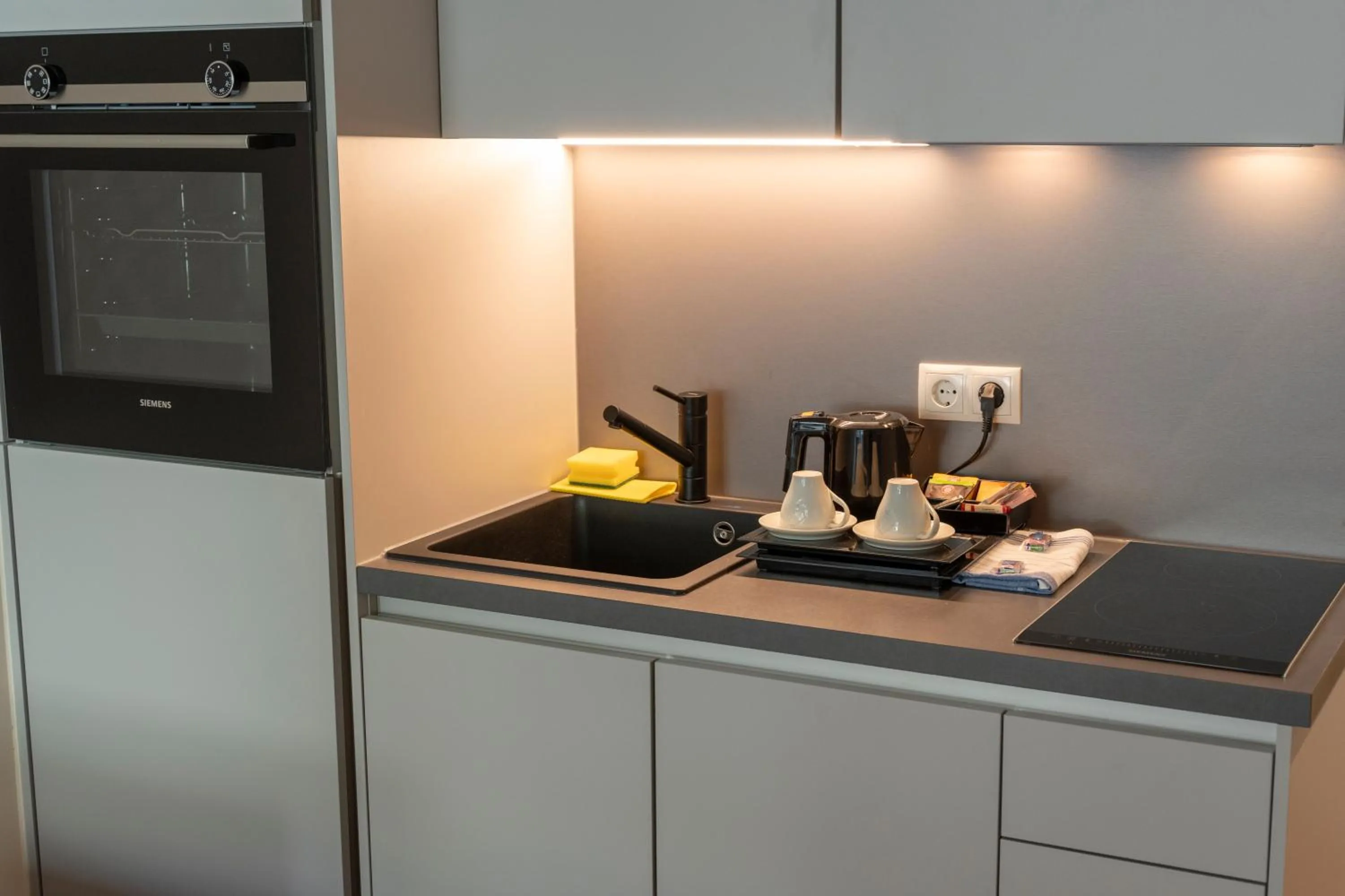 kitchen in Pakat Suites