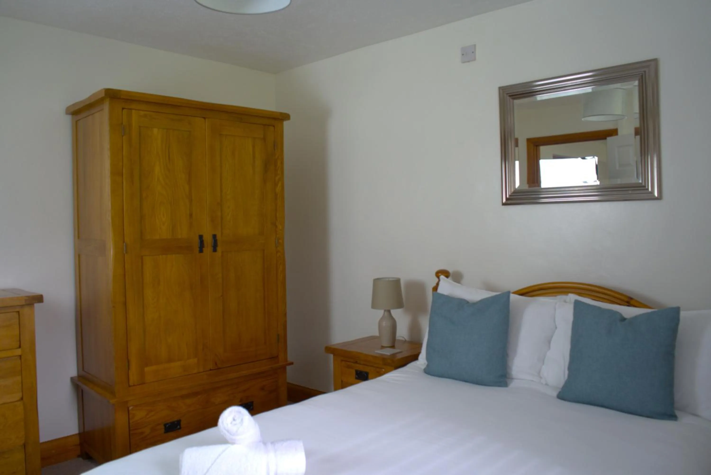 Bed in Glyndley Manor Cottages