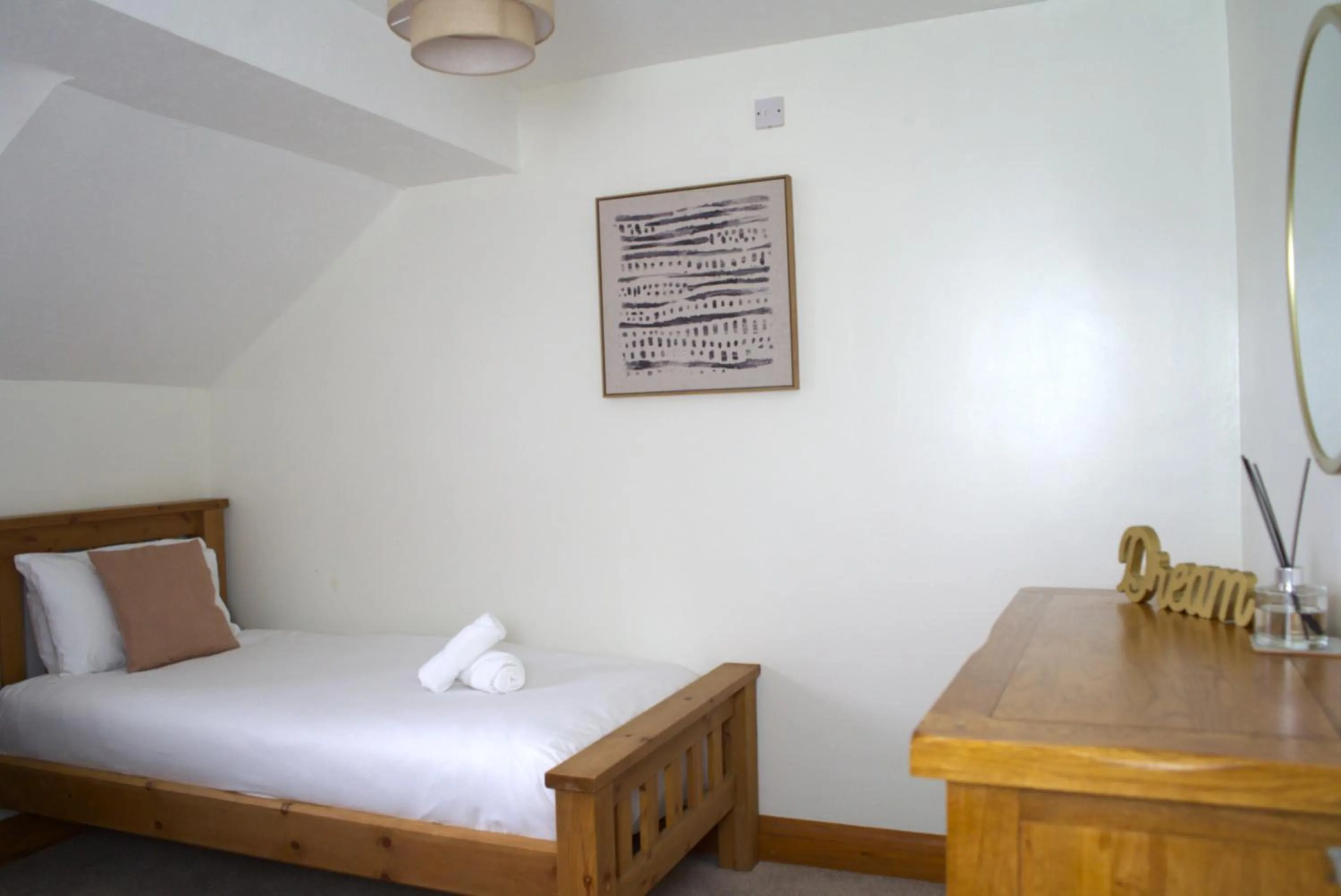 Bed in Glyndley Manor Cottages
