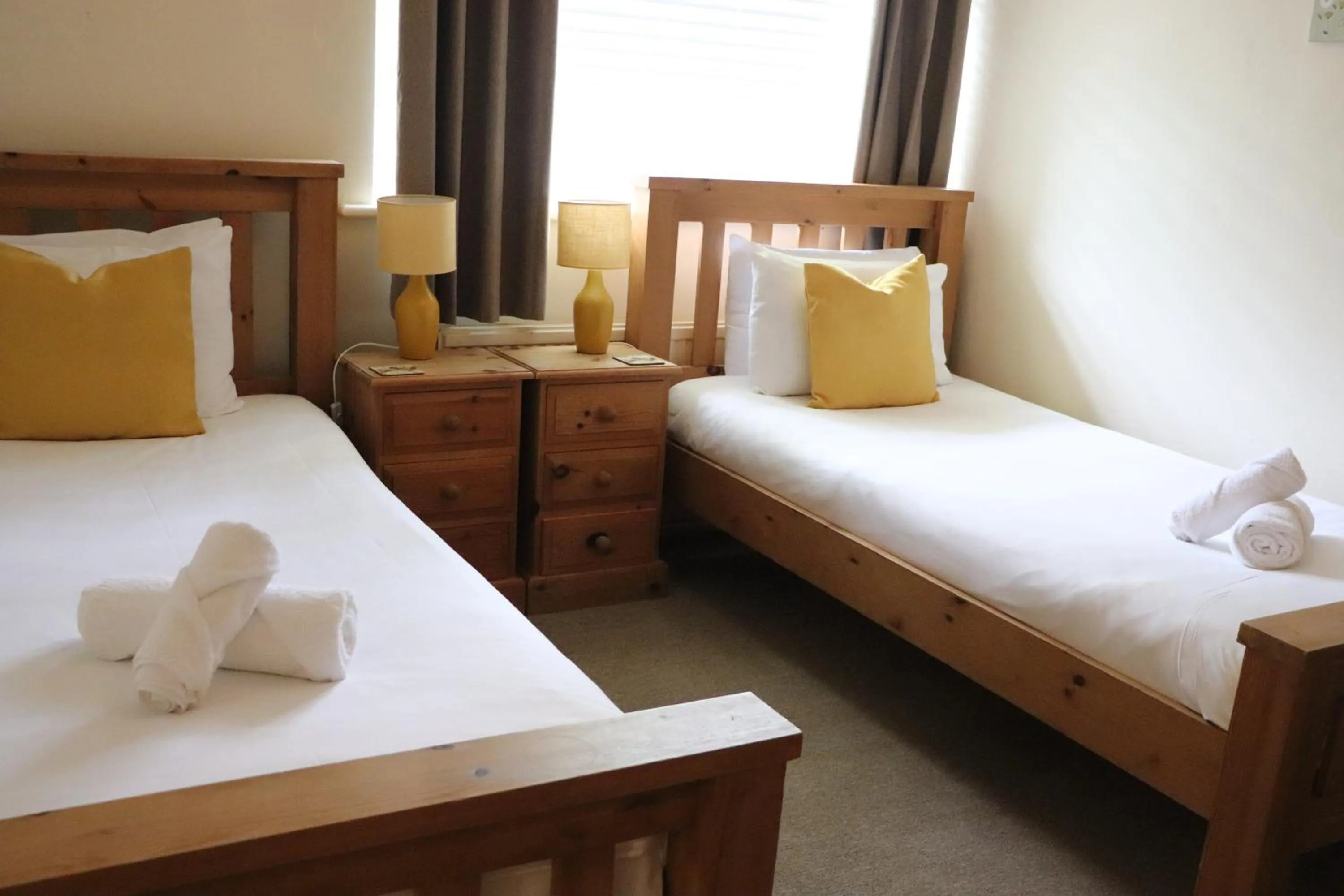 Bed in Glyndley Manor Cottages