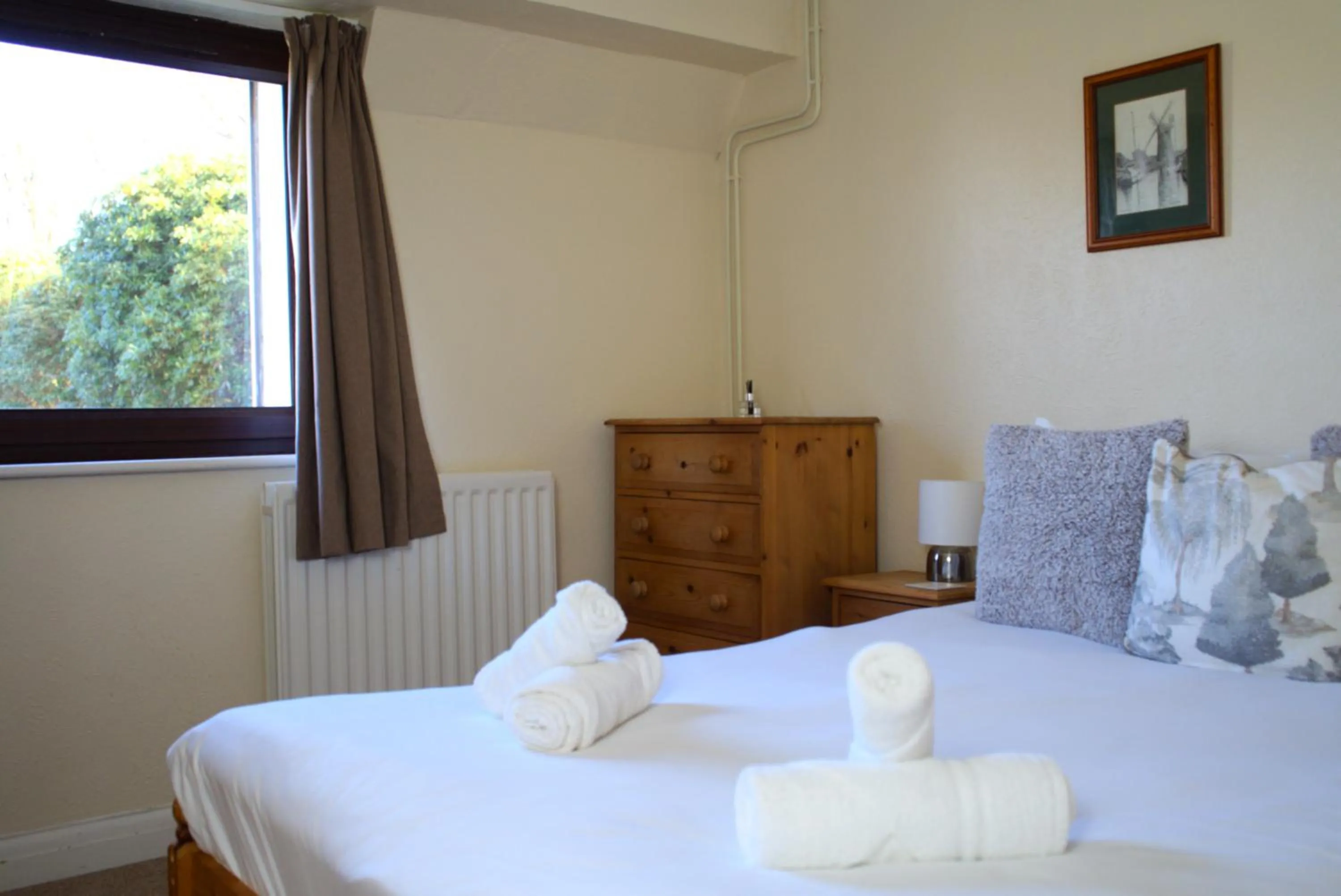 Bed in Glyndley Manor Cottages