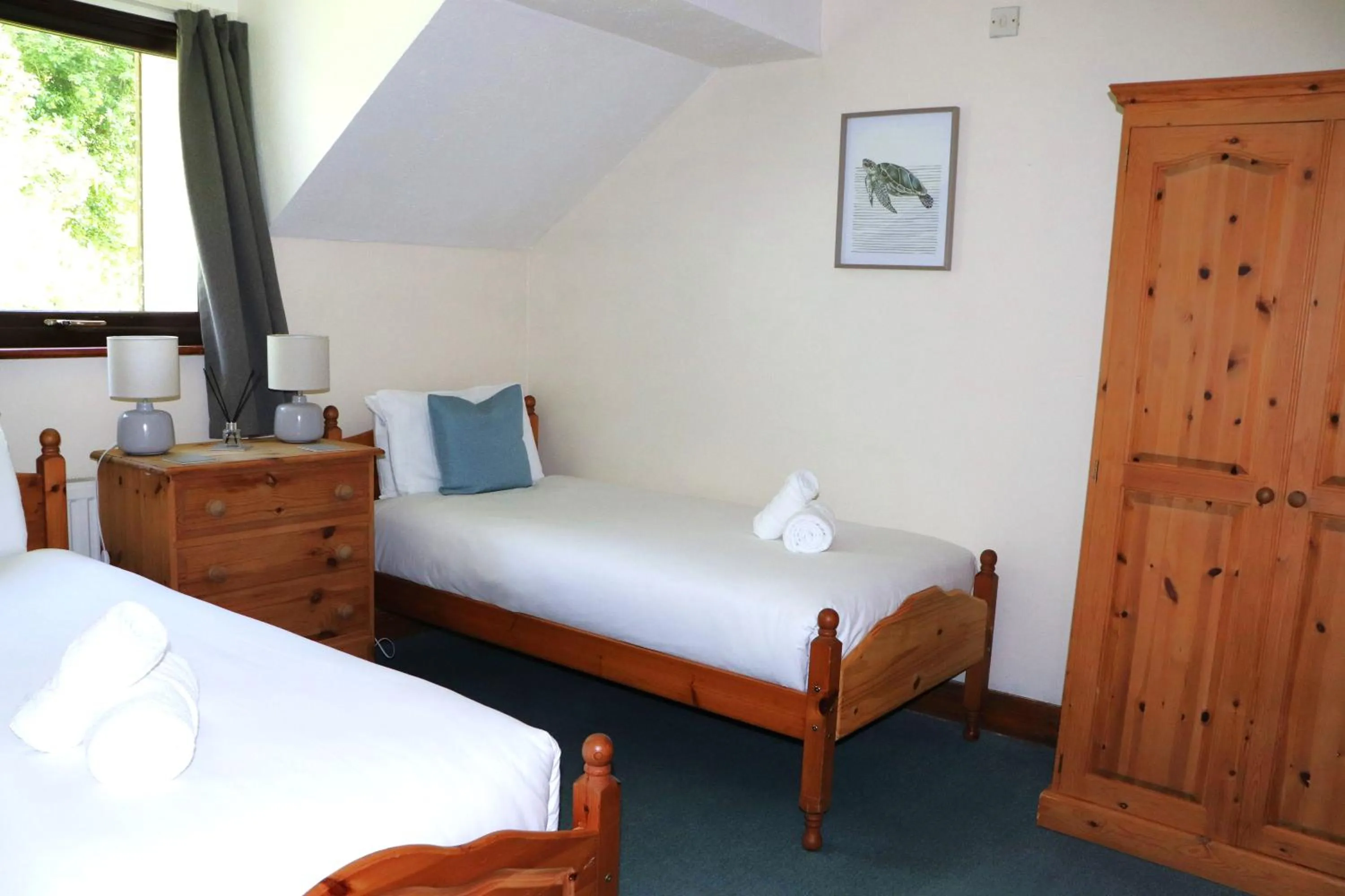 Bed in Glyndley Manor Cottages