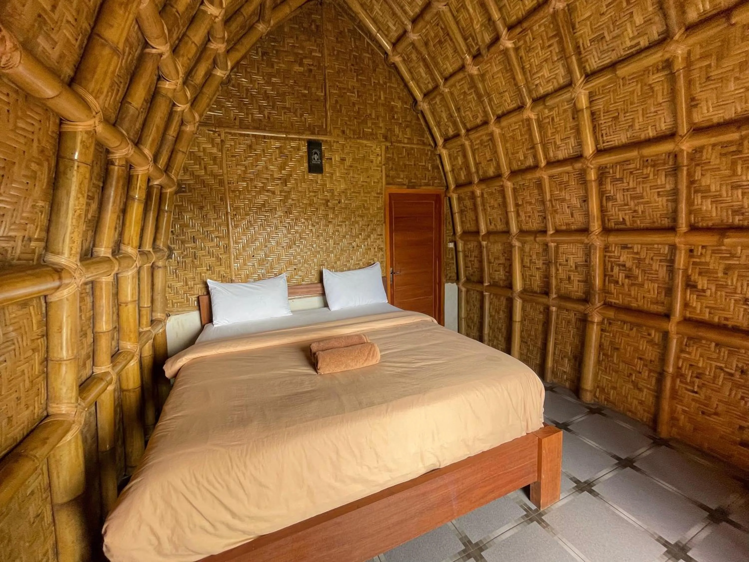 Bed in Villa Bambu Rinjani & Restaurant