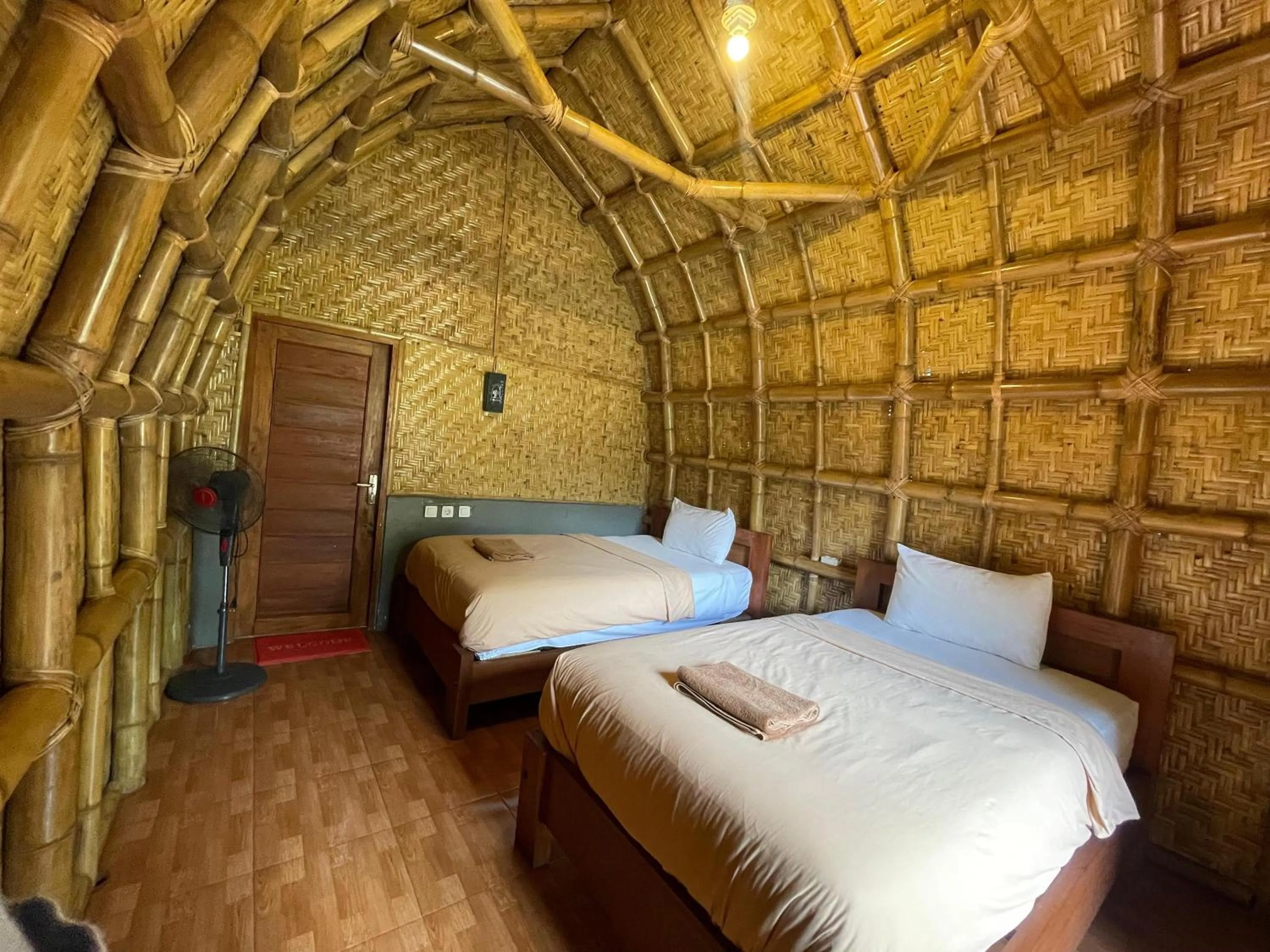 Bed in Villa Bambu Rinjani & Restaurant