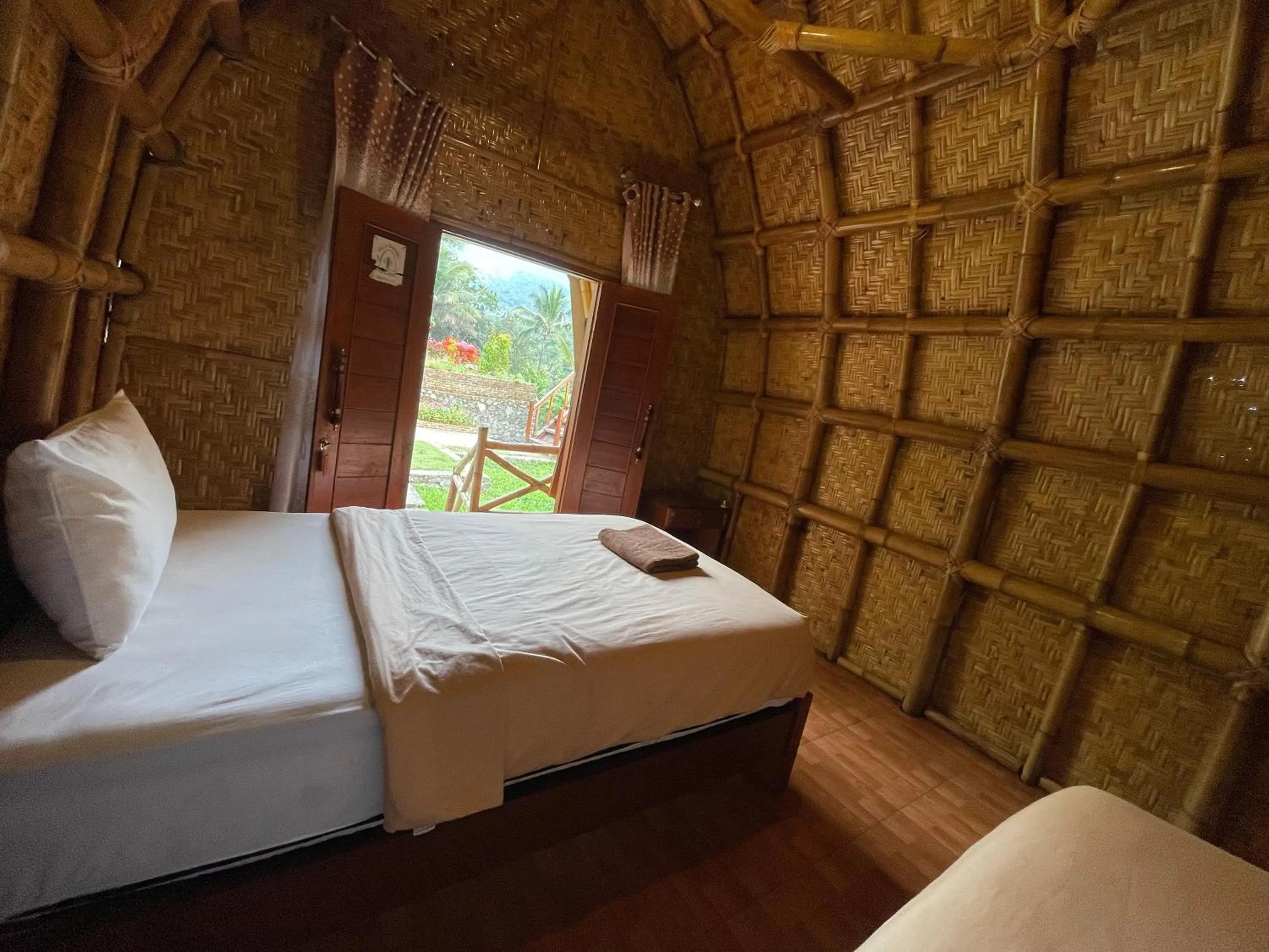 Bed in Villa Bambu Rinjani & Restaurant