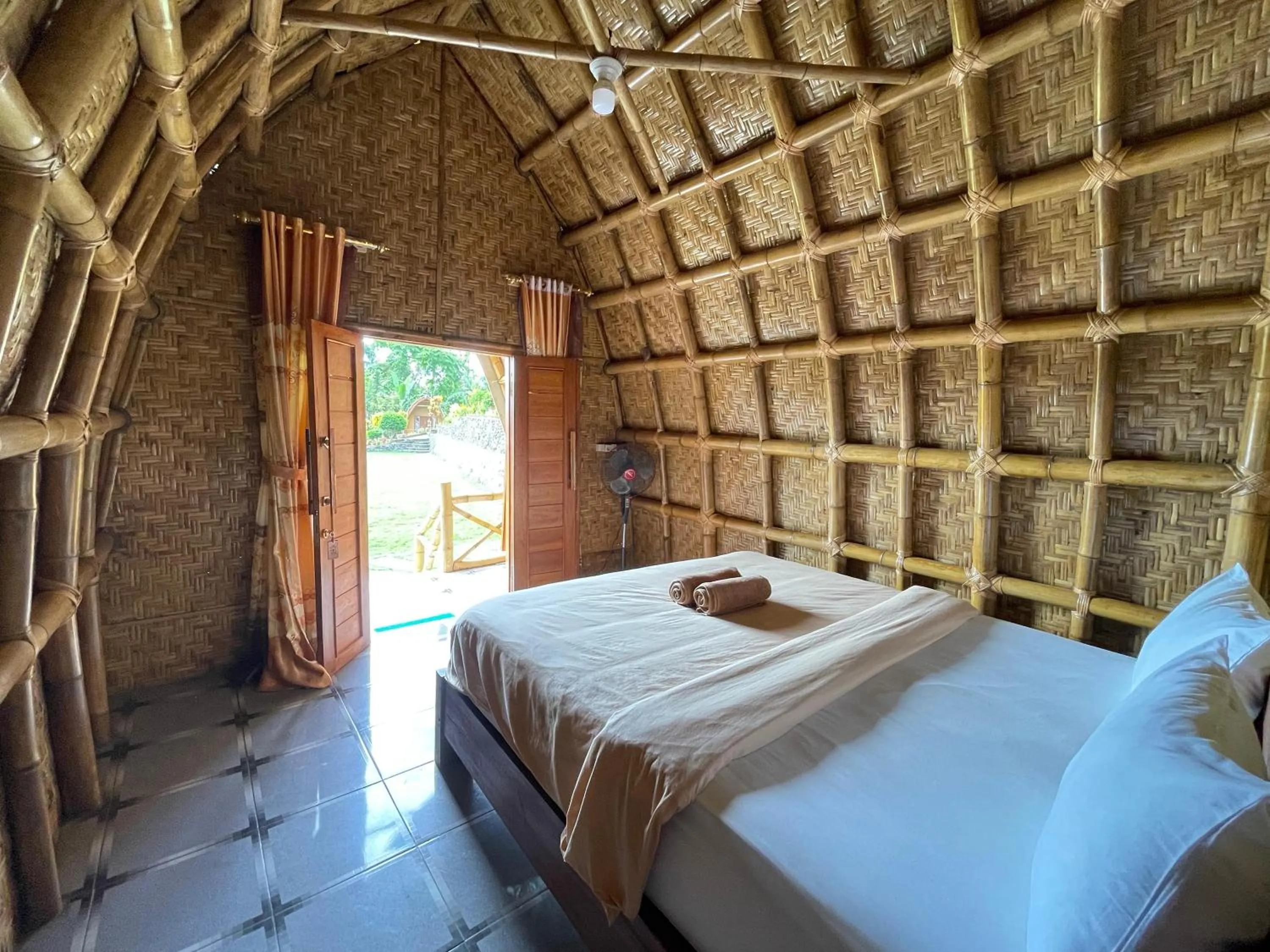 Bed in Villa Bambu Rinjani & Restaurant