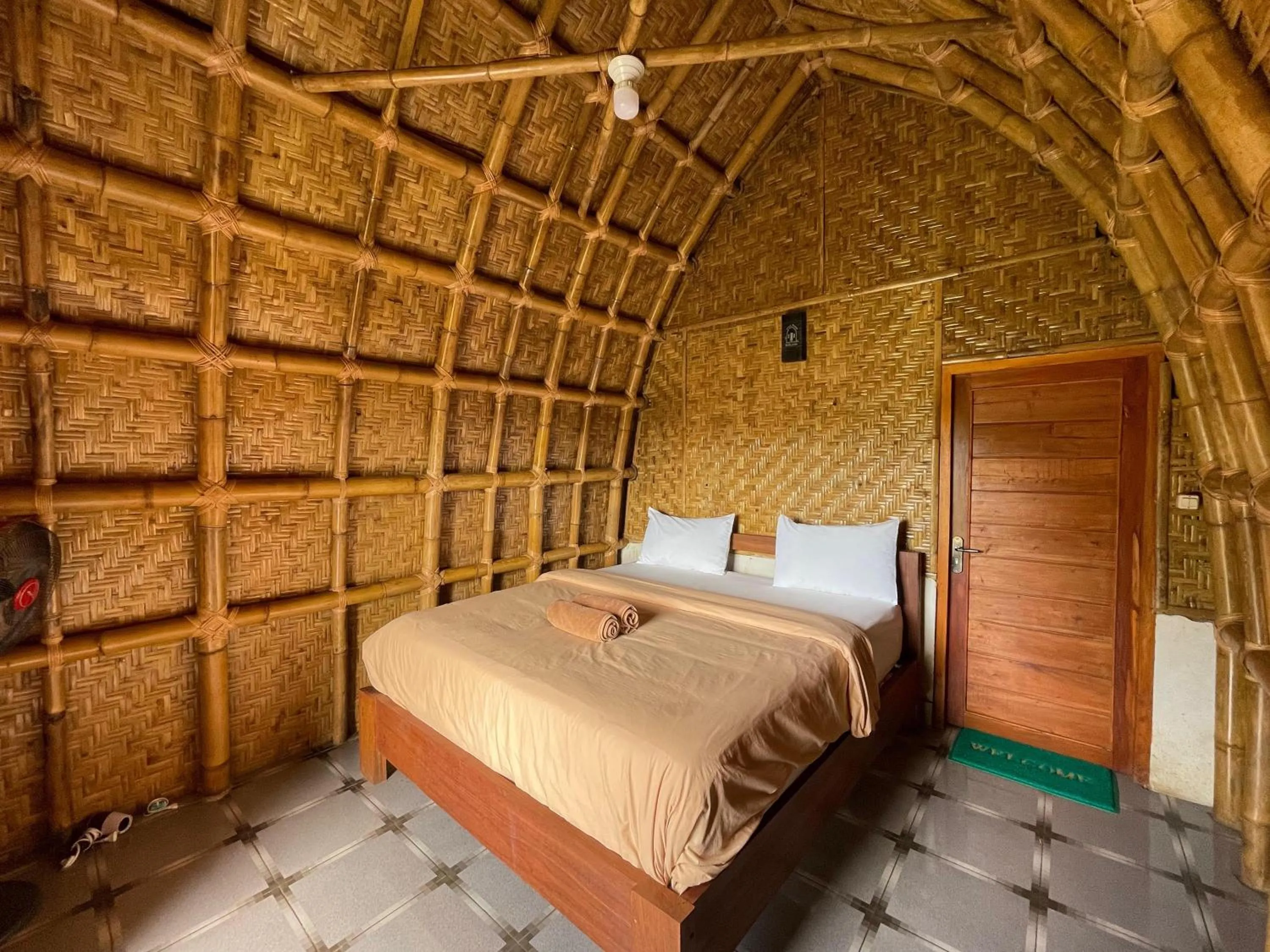 Bed in Villa Bambu Rinjani & Restaurant