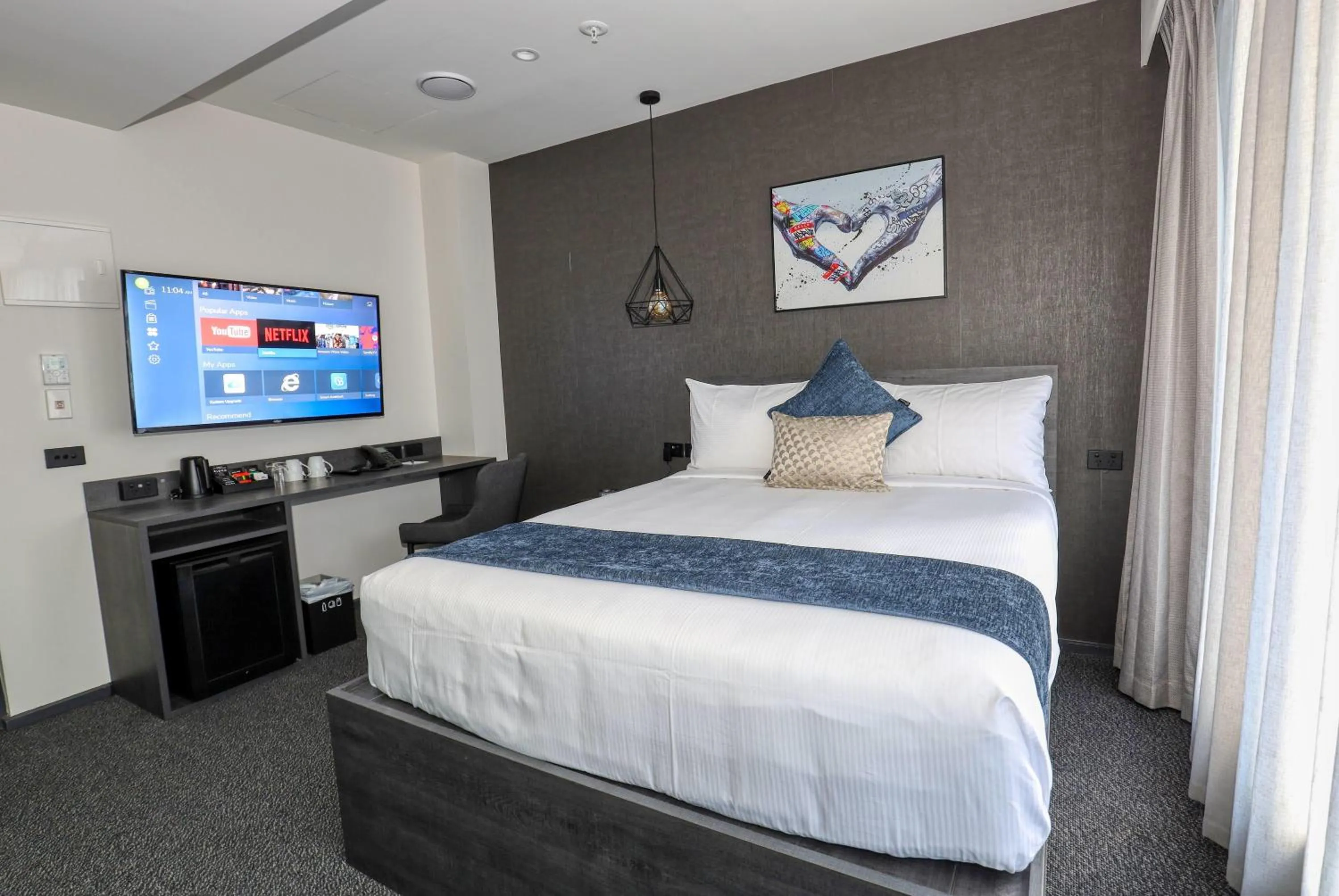 Photo of the whole room, Bed in Microtel by Wyndham Wellington