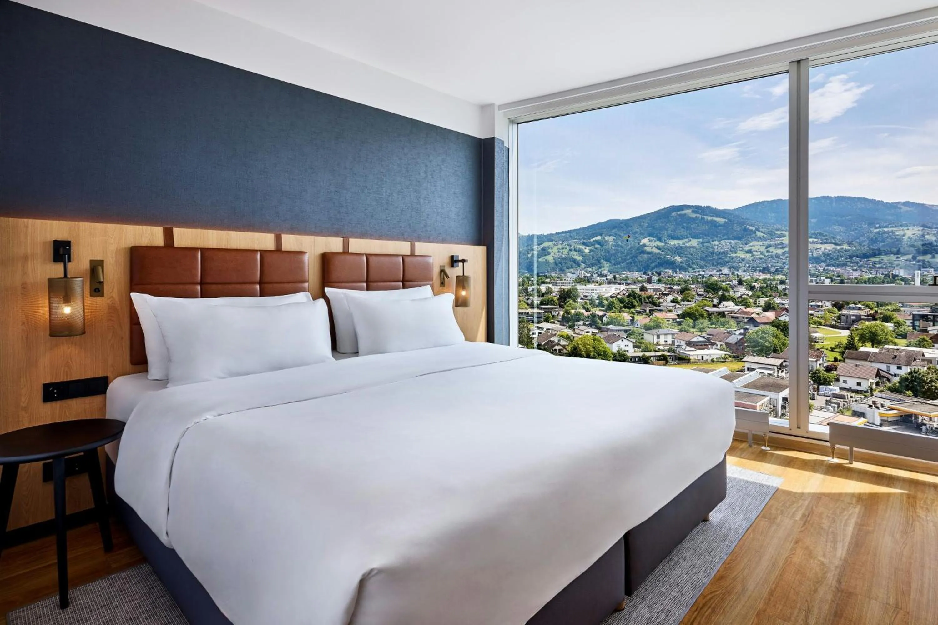 Photo of the whole room, Bed in Four Points by Sheraton Panoramahaus Dornbirn