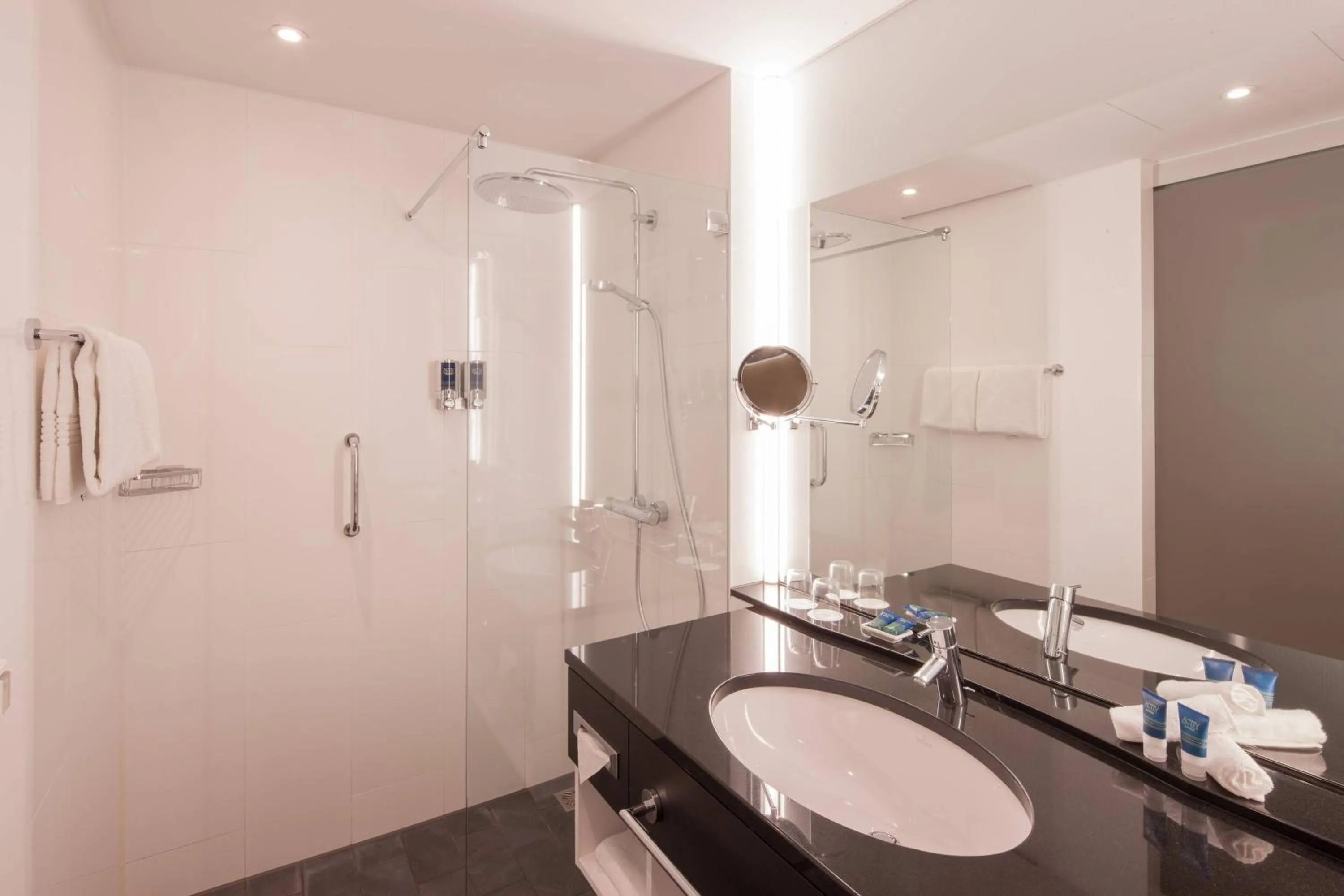 Bathroom in Four Points by Sheraton Panoramahaus Dornbirn