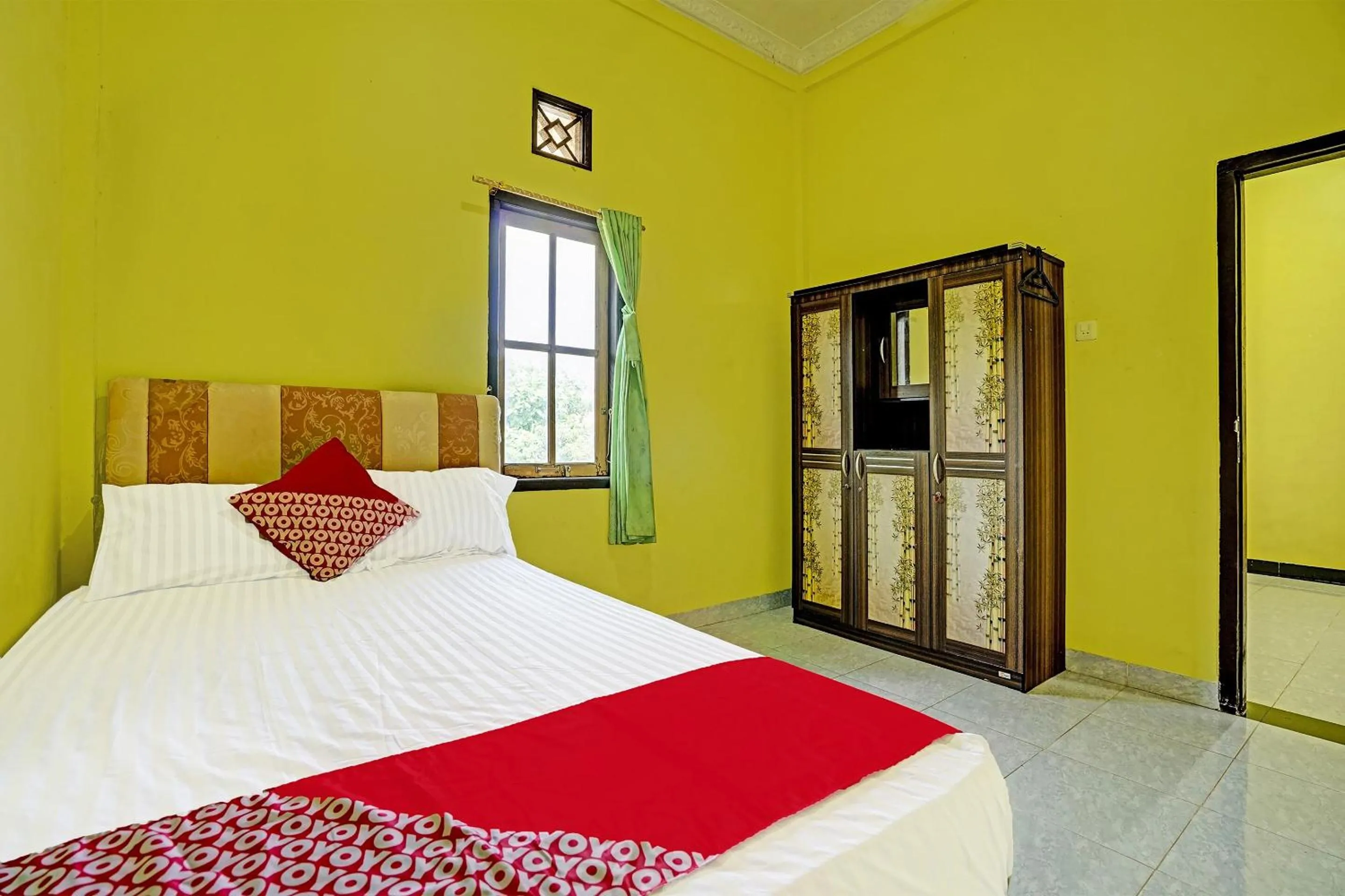 Bedroom in OYO 90508 Wisma Kenanga