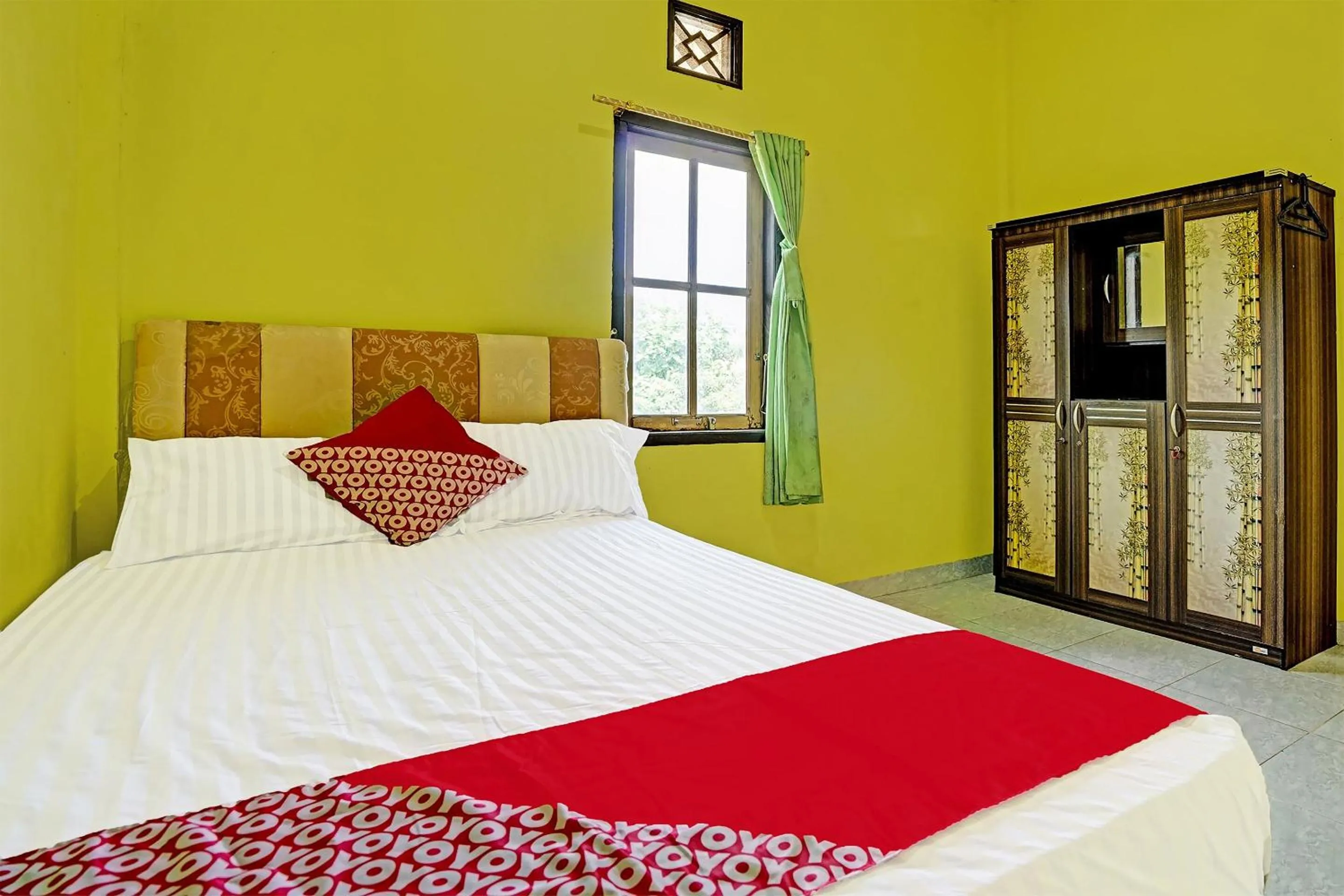 Bedroom in OYO 90508 Wisma Kenanga