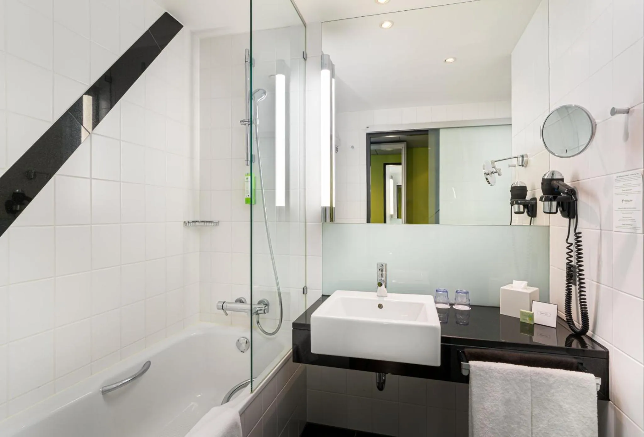 Bathroom in Holiday Inn Bern Westside by IHG