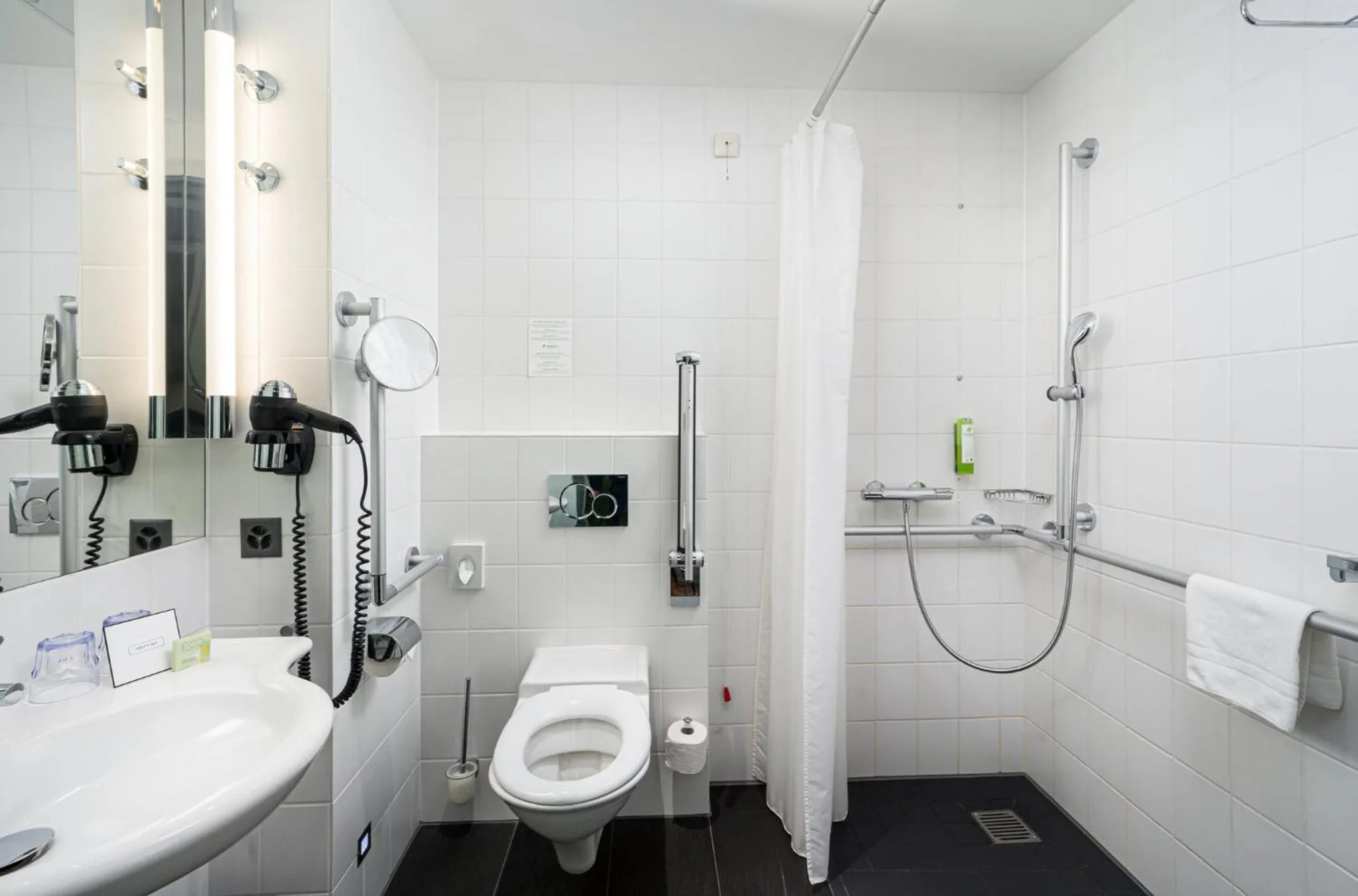 Bathroom in Holiday Inn Bern Westside by IHG