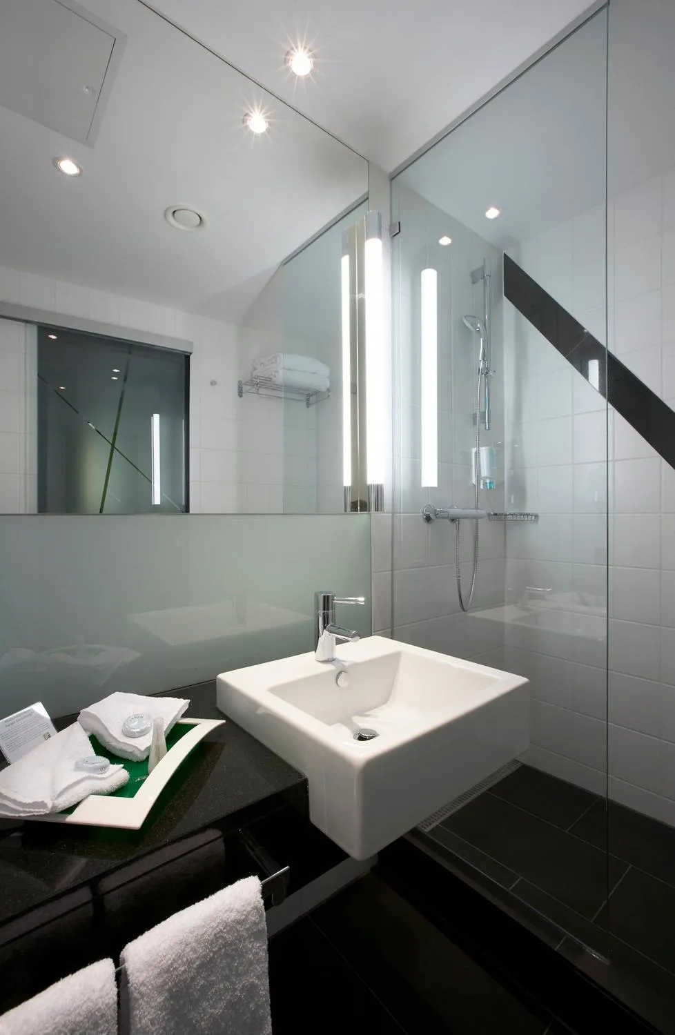 Bathroom in Holiday Inn Bern Westside by IHG