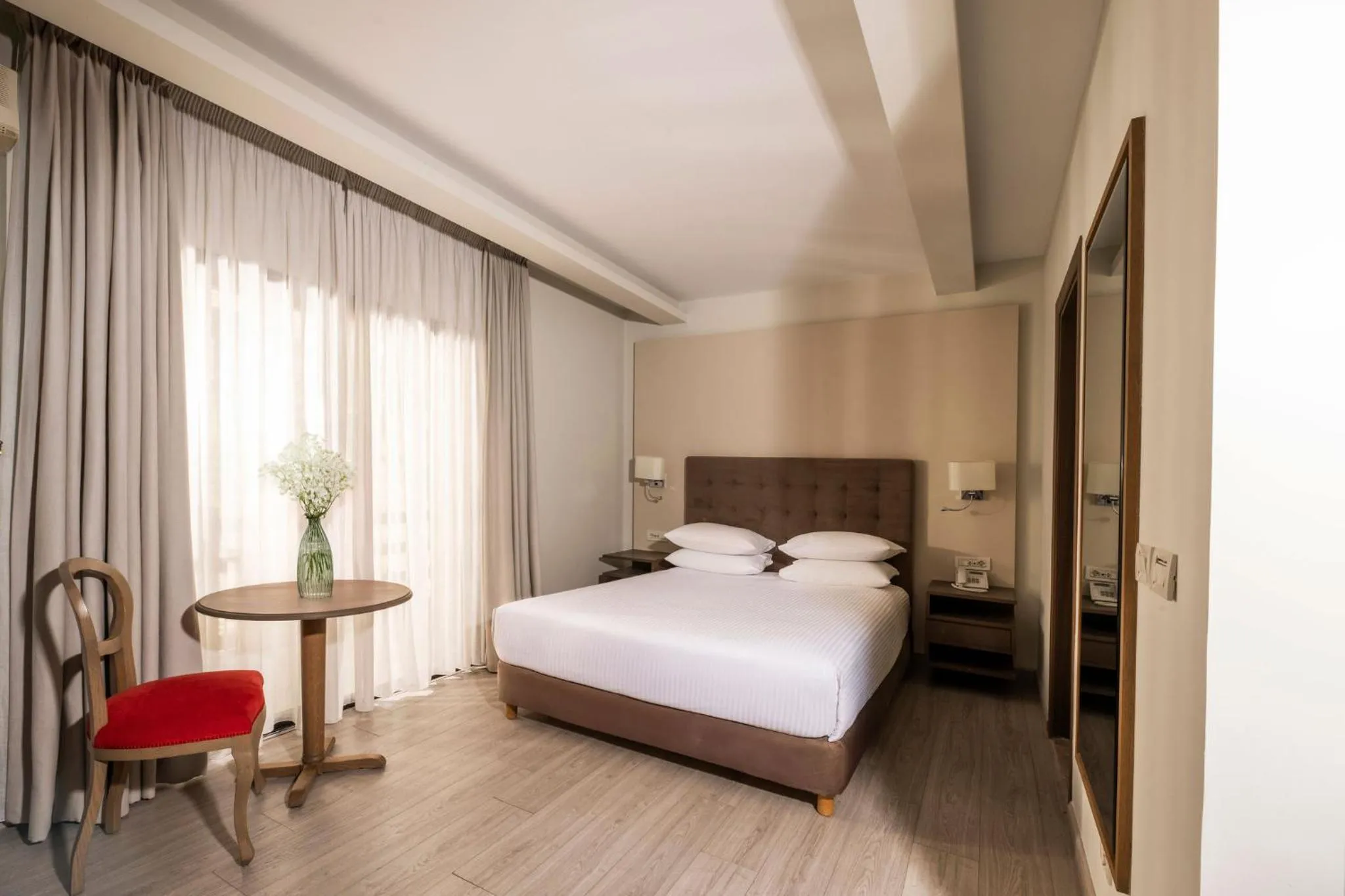 Photo of the whole room, Bed in InterContinental Mzaar Lebanon Mountain Resort & Spa by IHG