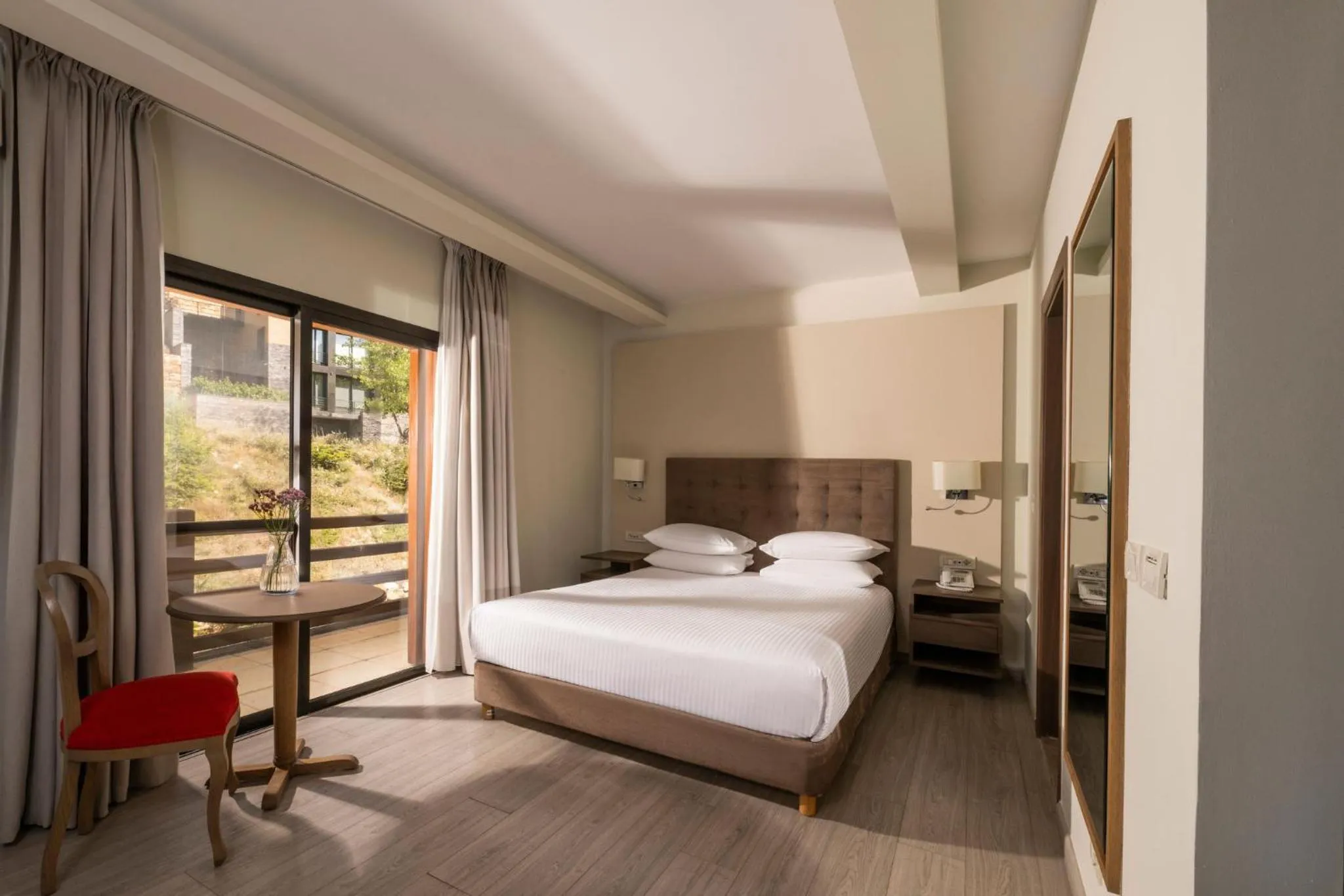 Photo of the whole room, Bed in InterContinental Mzaar Lebanon Mountain Resort & Spa by IHG