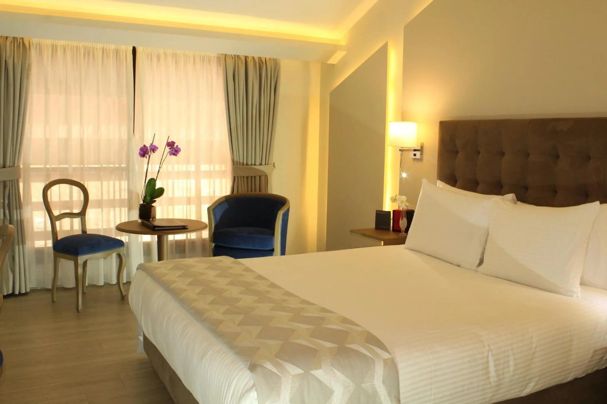 Photo of the whole room, Bed in InterContinental Mzaar Lebanon Mountain Resort & Spa by IHG