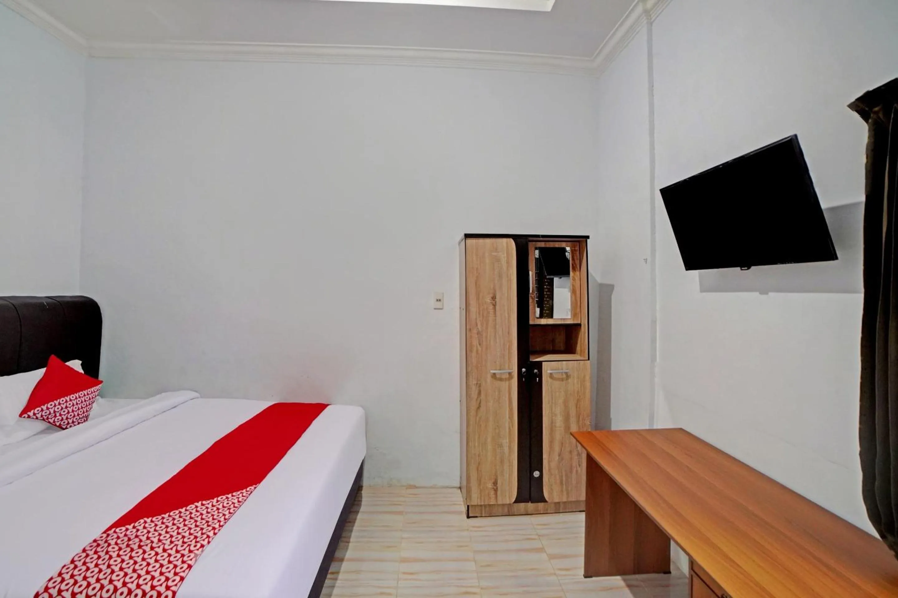 Bedroom in Hotel O Madina Residence Syariah
