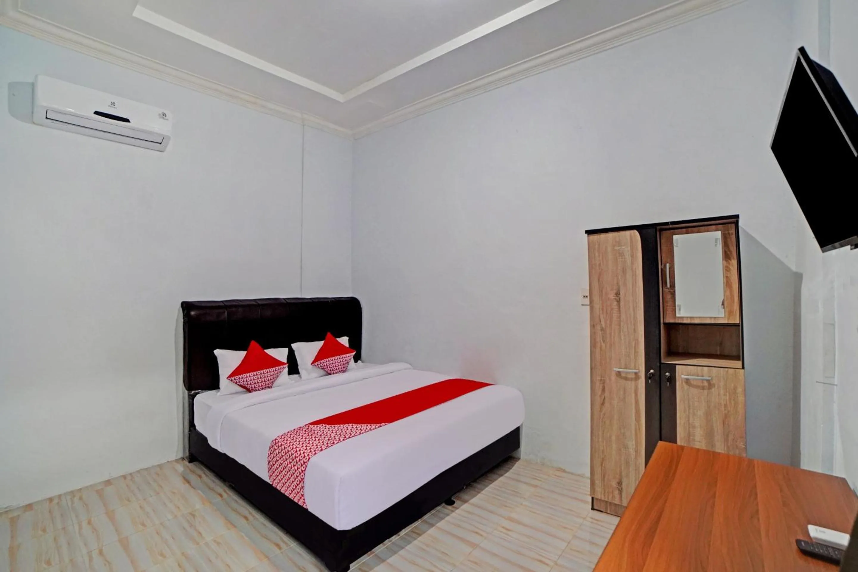 Bedroom in Hotel O Madina Residence Syariah