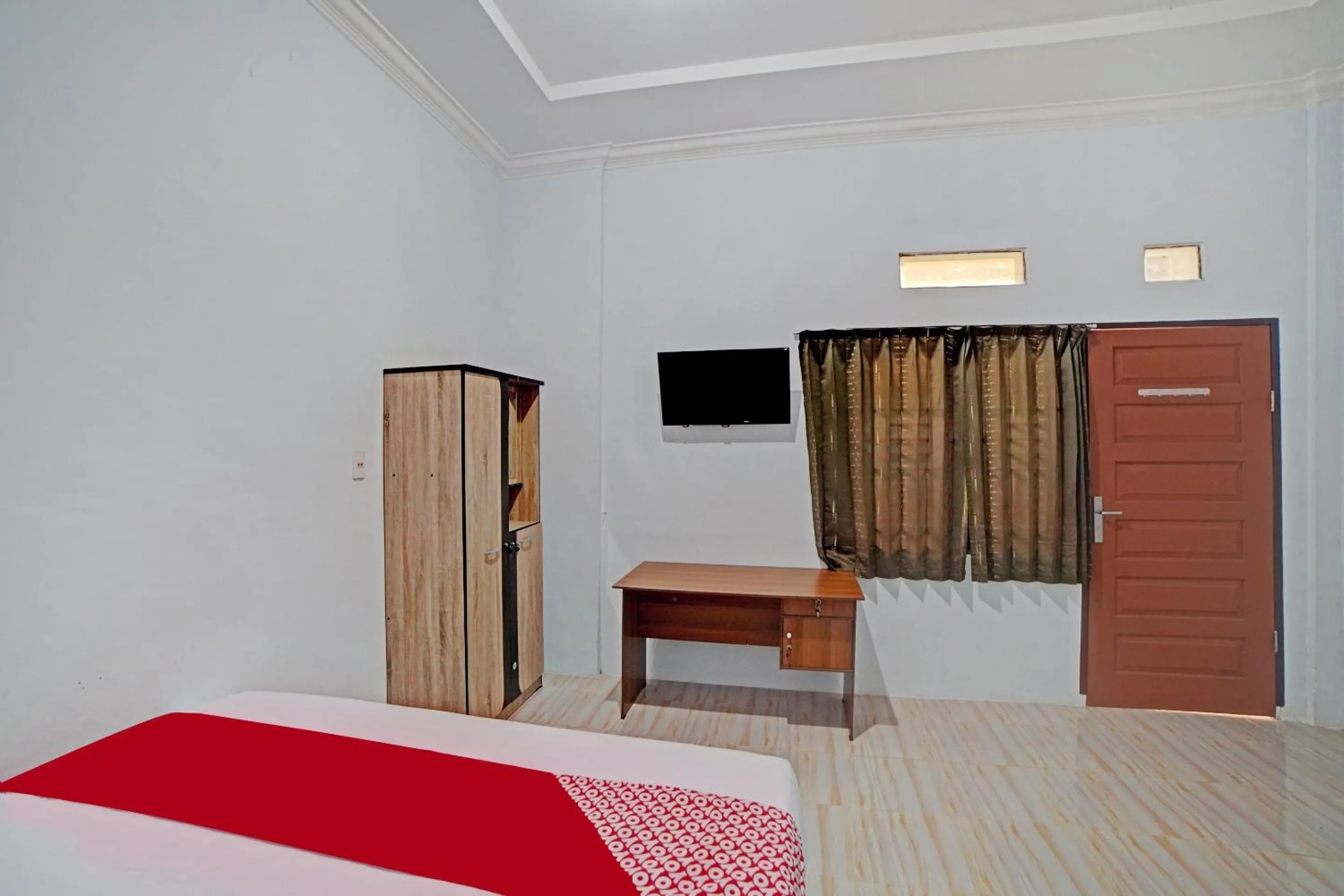 Bedroom in Hotel O Madina Residence Syariah