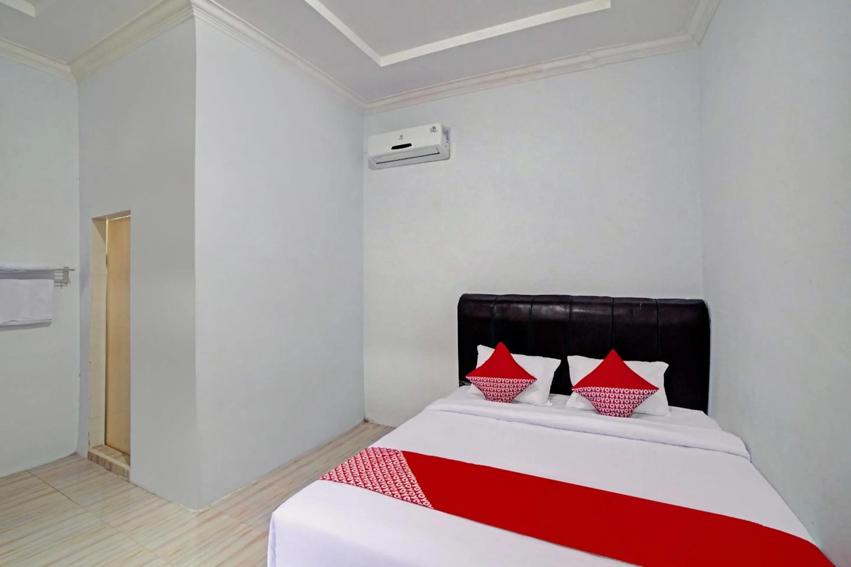 Bedroom in Hotel O Madina Residence Syariah