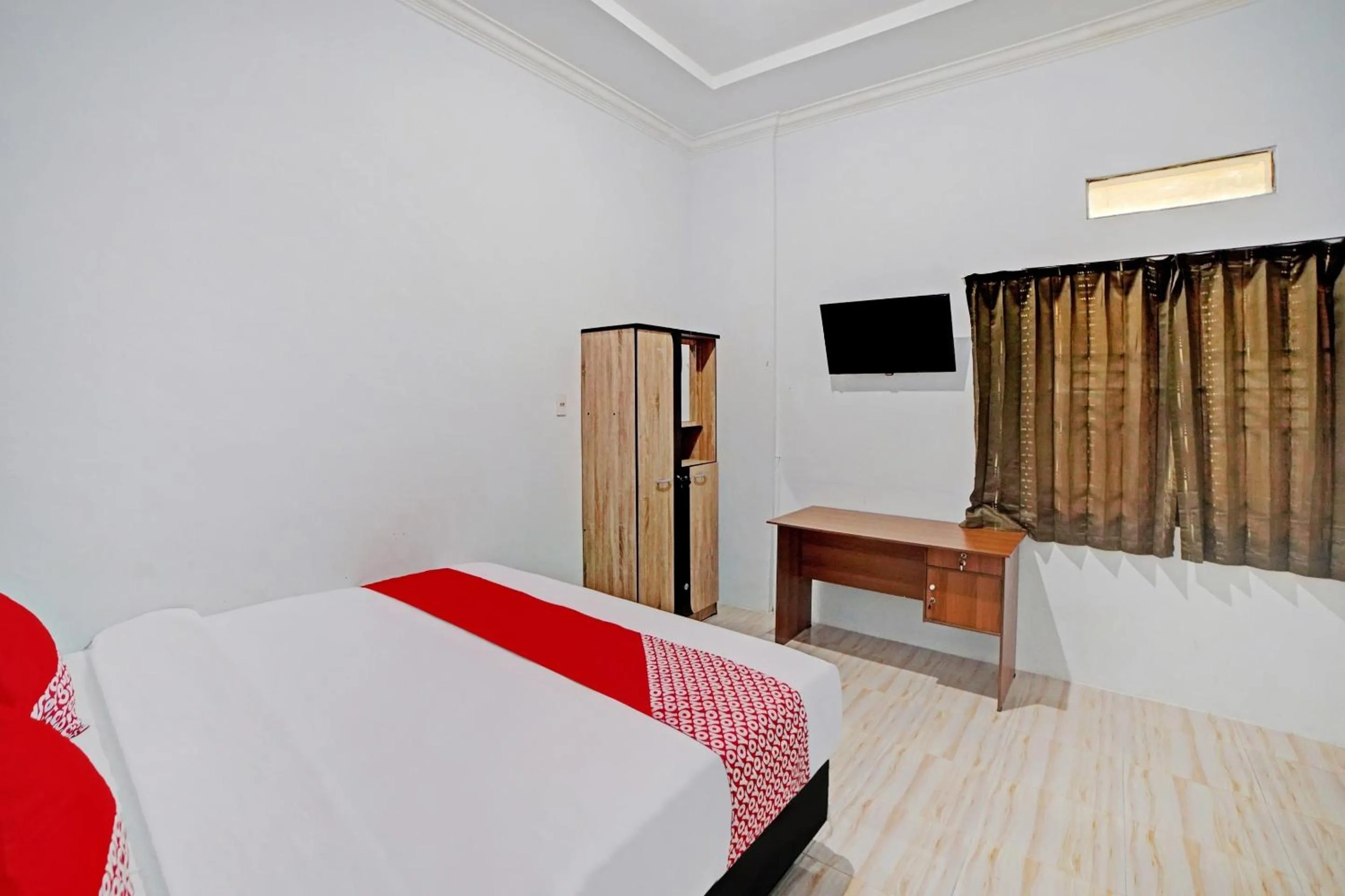 Bedroom in Hotel O Madina Residence Syariah
