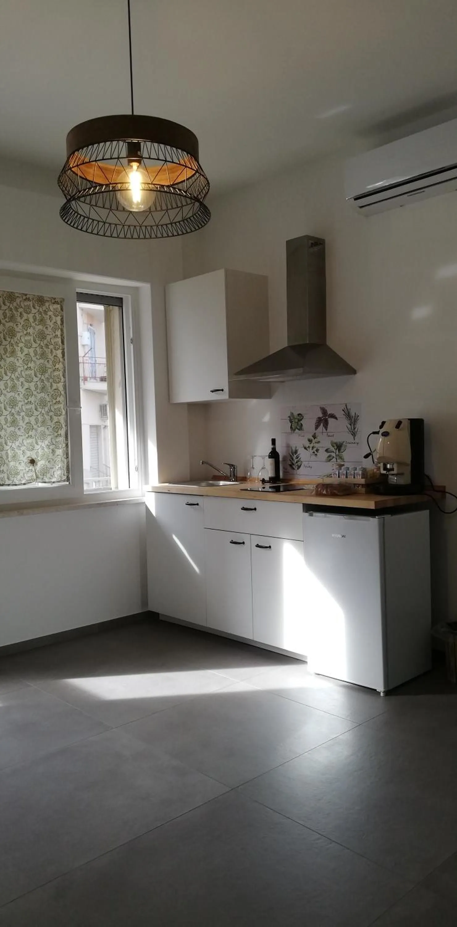 Kitchen or kitchenette in AMARE MATERA comfortable rooms
