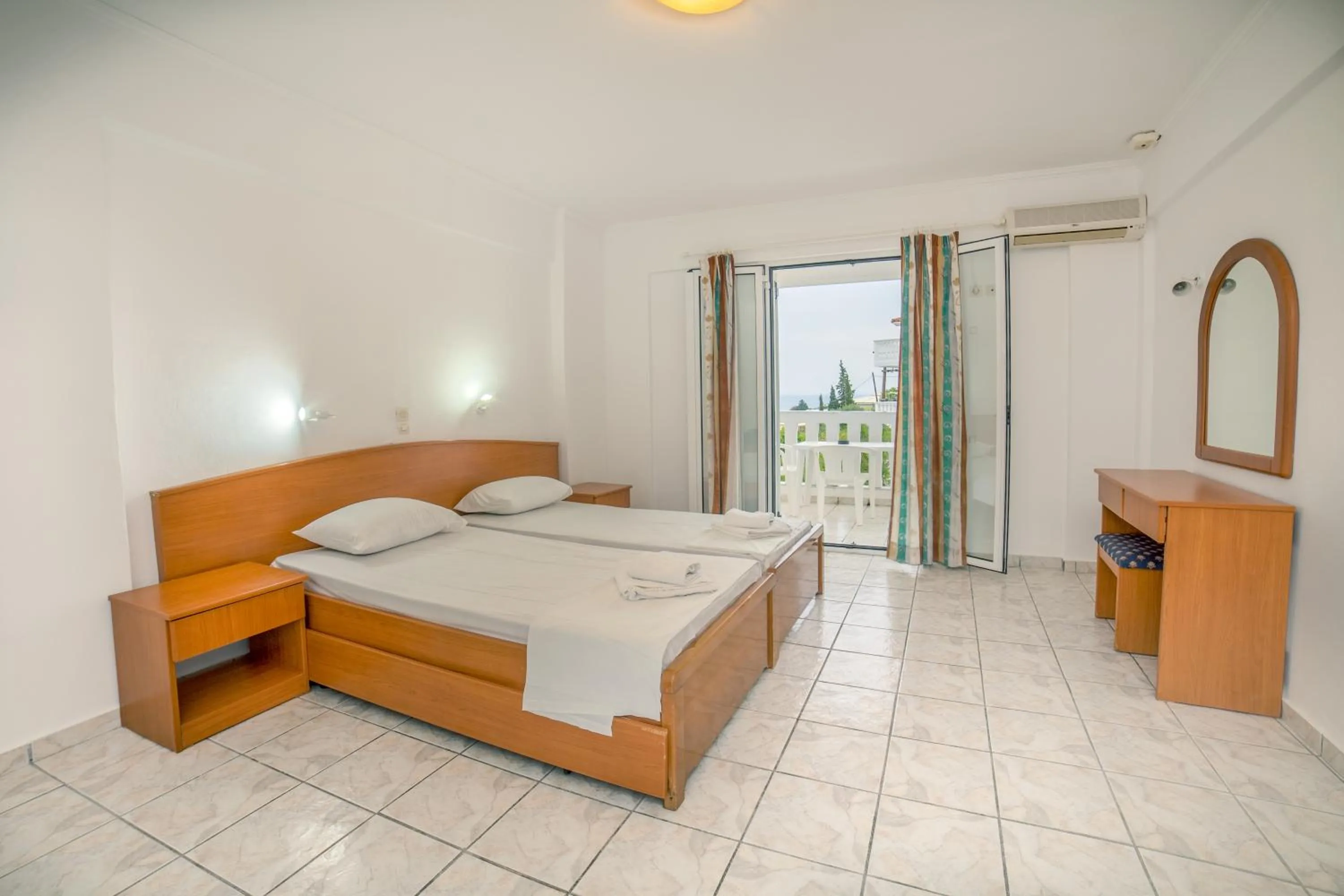 Photo of the whole room, Bed in All In Krinas Apart-Hotel