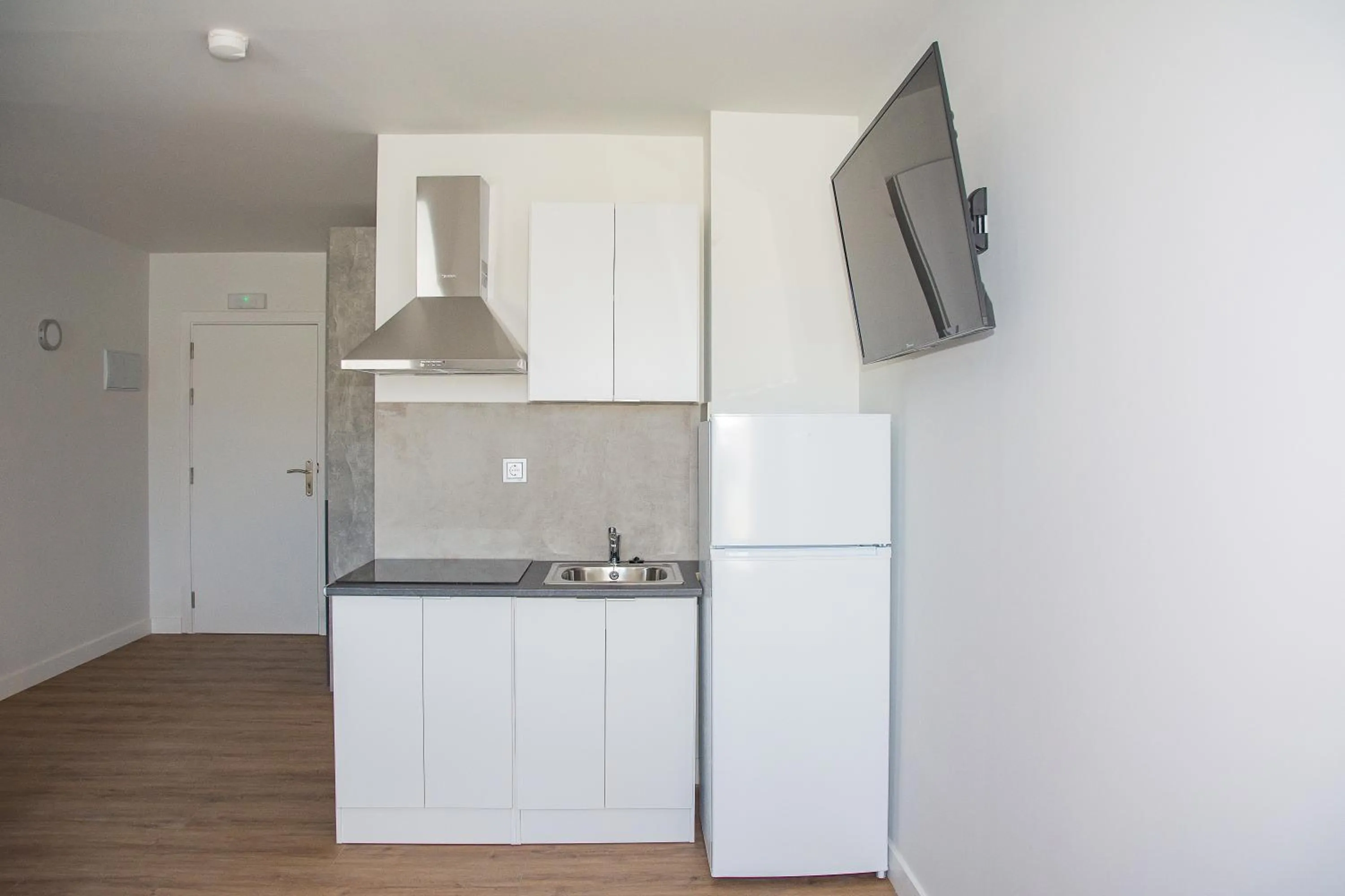 Kitchen or kitchenette in Apartamentos Santander Maliaño Suites 3000