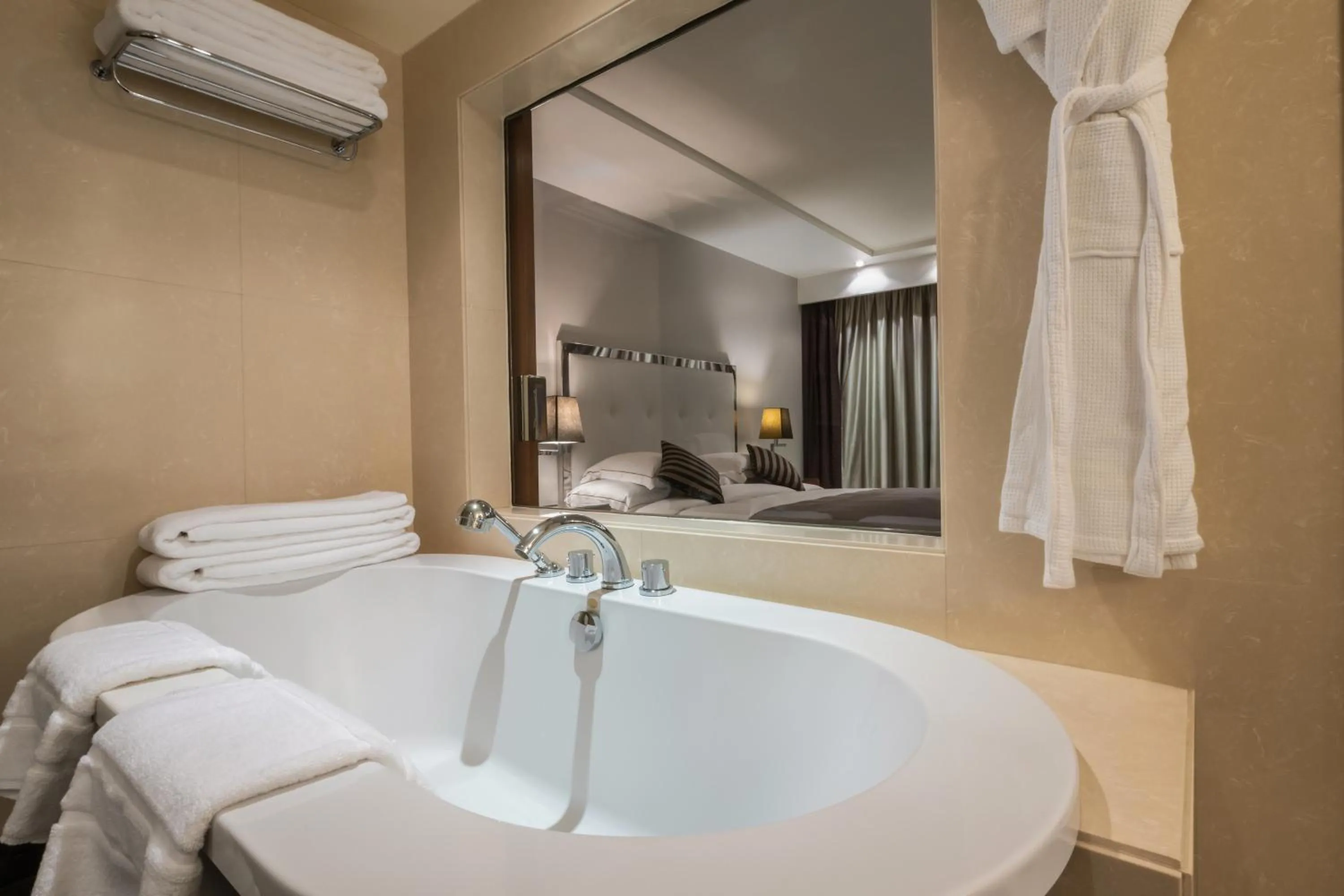 Bathroom, Bed in Mövenpick Hotel Beirut